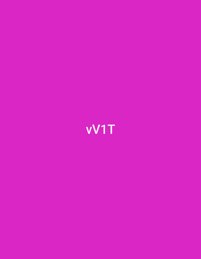 The image features a solid, uniform magenta background. Centered on this background are four white characters: "vV1T". No other subjects, objects, individuals, or environmental details are depicted within the frame. The image itself provides no visual cues to suggest a specific geographical location; however, based on the provided contextual information, this image is situated in the city of Casablanca, Morocco.