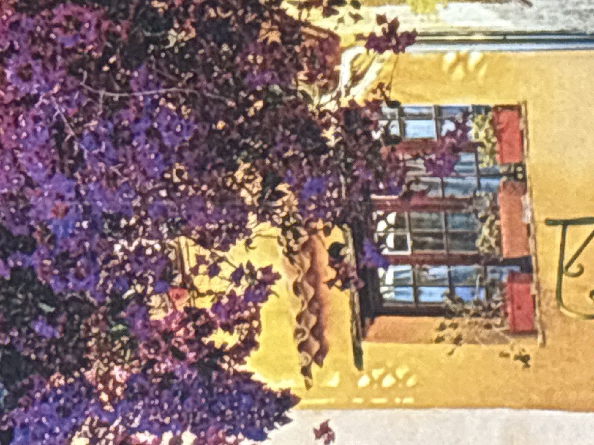 The image is a close-up, possibly painted or heavily filtered, depiction of a building facade. A vibrant yellow wall is the dominant feature, with a tiled roofline visible near the top. A dark-paned window is set into the wall, and below it are several planters containing green foliage. Overhanging the scene is a dense canopy of purple flowers, possibly bougainvillea, casting shadows on the yellow wall. The overall impression is one of a warm, possibly Mediterranean, setting, with a focus on the building and the overhanging flora. There is no indication of the city of Georgiyevsk, Russia, or any specific location within it.
