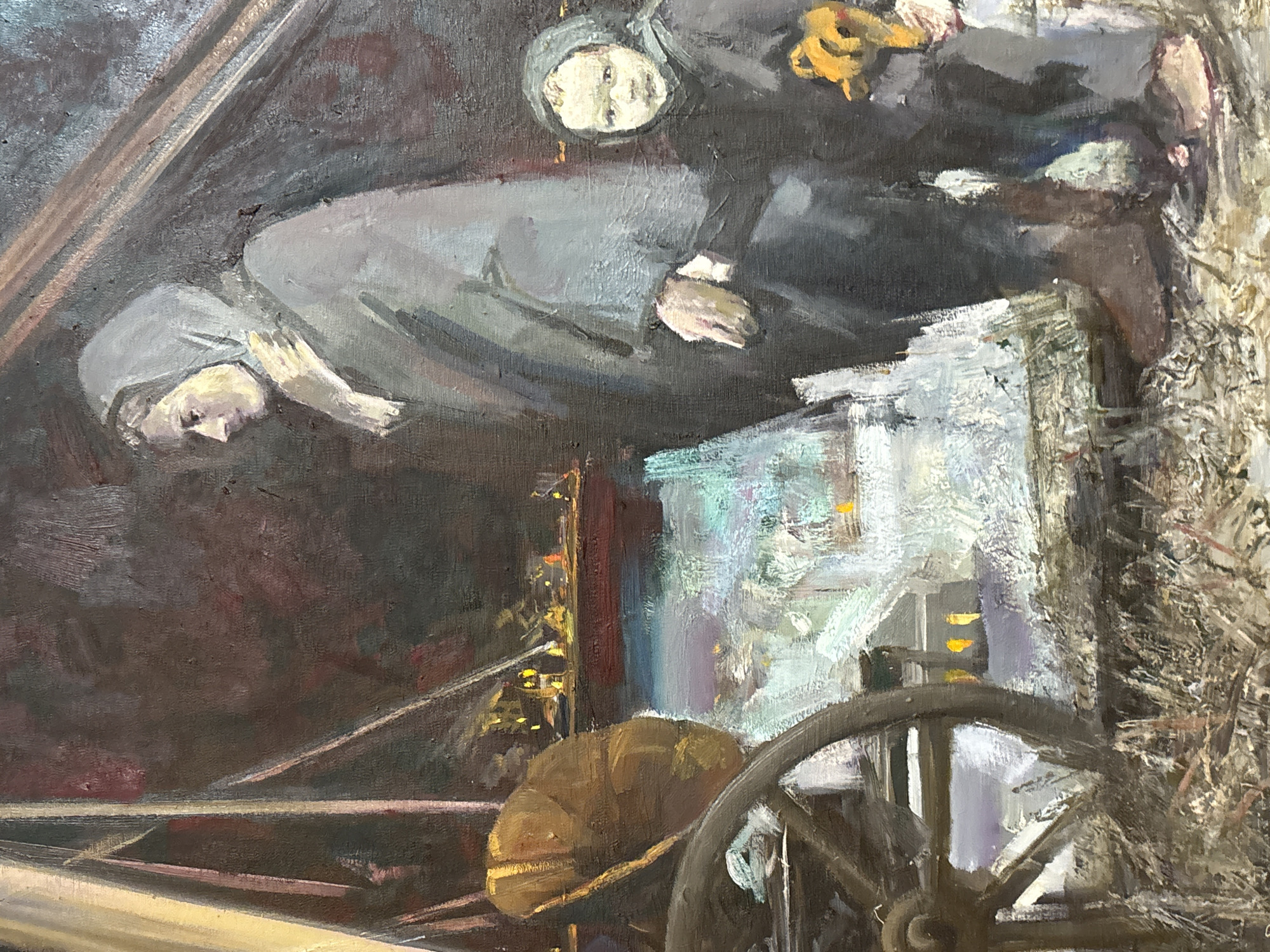 The image appears to be an oil painting depicting a scene from a city, possibly a historical setting. The painting shows two figures; one figure lying down and another appears to be standing above them. A building with lights on is visible through an open window. A large wagon wheel dominates the lower portion of the image. There is straw or hay along the side. The setting and location details are unclear.