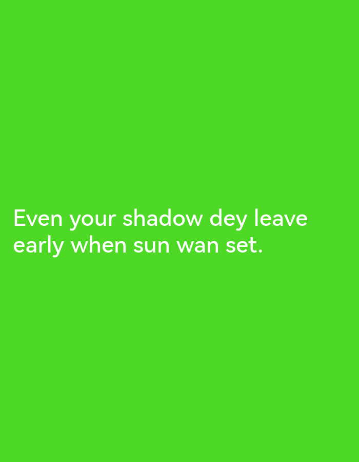 The image is a photograph of a bright green background with white text overlayed on the lower half. The text reads: "Even your shadow dey leave early when sun wan set." There is no discernible urban environment, people, or specific objects that would indicate a location in Lagos, Nigeria, or any other city.