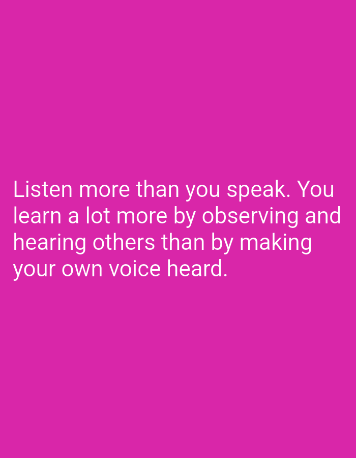 The image is a photograph of white text on a pink background. The text reads: "Listen more than you speak. You learn a lot more by observing and hearing others than by making your own voice heard." There is no information in the image to indicate its location in Onitsha, Nigeria.