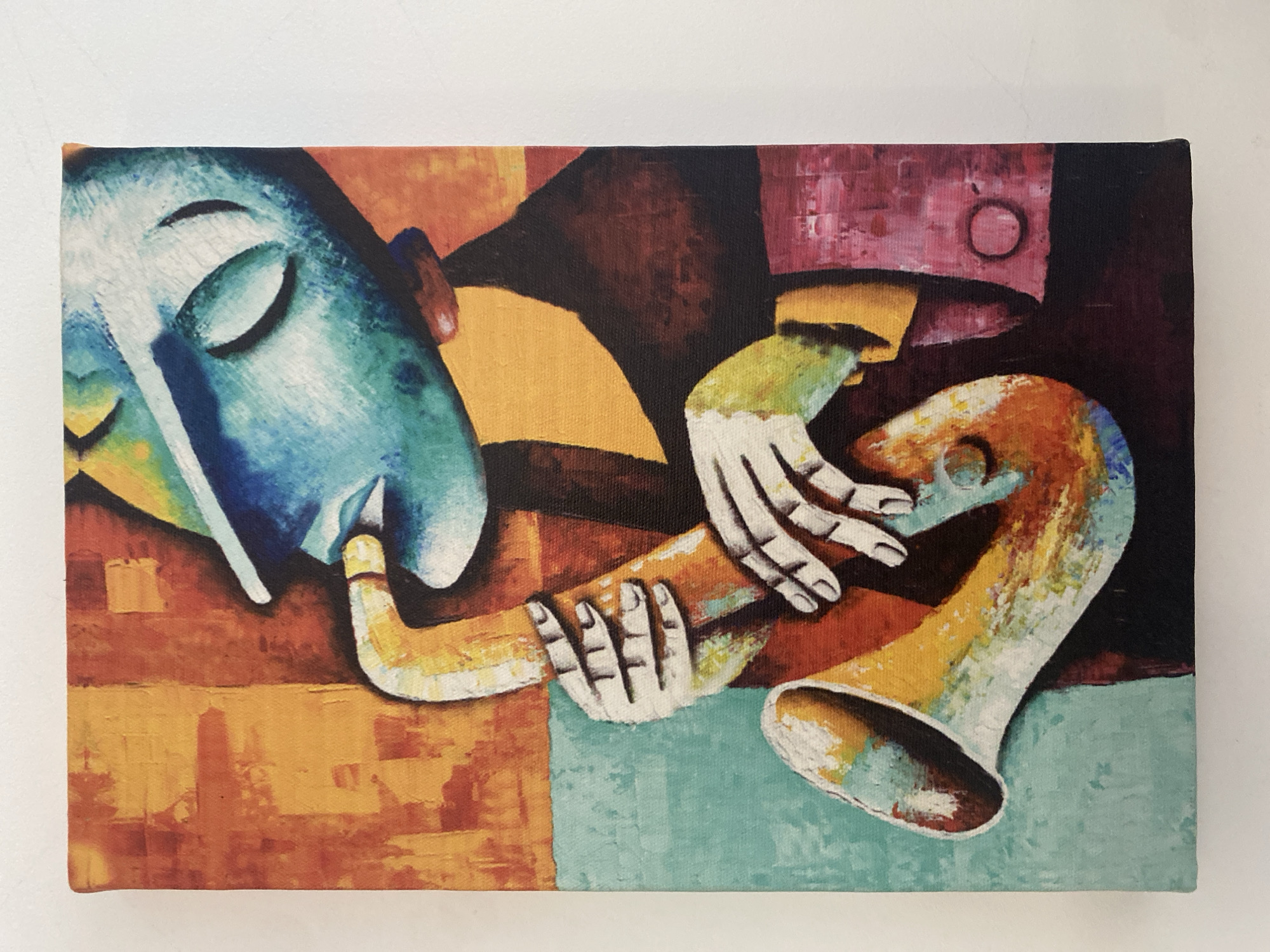 This media file features a painting, likely acrylic or oil on canvas, depicting a stylized musical figure. The artwork exhibits a vibrant, abstract style with cubist or expressionist influences, characterized by bold color blocking and simplified forms.
The main subject is a figure with a head rendered in varying shades of blue and green, tilted towards the right. The eyes are closed, conveying a sense of introspection, serenity, or deep concentration while playing. The figure's hands, depicted in white with dark outlines suggesting bones or structure, grasp a brass or woodwind instrument resembling a saxophone. The instrument itself is stylized with warm orange and yellow tones.
The background is composed of large, abstract blocks of contrasting colors, including warm oranges, deep red-browns, dark purplish-browns, and a cool teal-green on the lower right. These color fields create a dynamic yet harmonious backdrop for the musician. Visible brushstrokes and the texture of the canvas are evident throughout the painting, particularly in the cropped sections, indicating an original artwork.
The activity taking place is a musician deeply engrossed in playing their instrument. The closed eyes suggest an emotional connection to the music, possibly in a state of meditation or intense focus. There are no specific location cues within the painting itself, nor any discernible text. The photograph of the painting was taken in Sofia, Bulgaria.