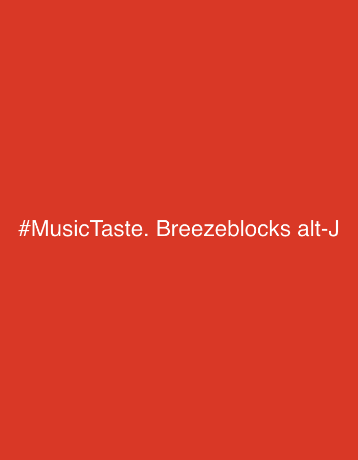 The image features white text prominently displayed against a solid, vibrant red background. The text is centered on the screen and reads: "#MusicTaste. Breezeblocks alt-J". There are no people, objects, or a discernable scene or setting beyond the colored background and the text. No specific activity or event is taking place. The image does not provide any visual cues regarding time of day, weather, or emotions. The provided location context of Moscow, Russia, is not supported by any visual information within the image itself, as it consists solely of text on a plain colored background.