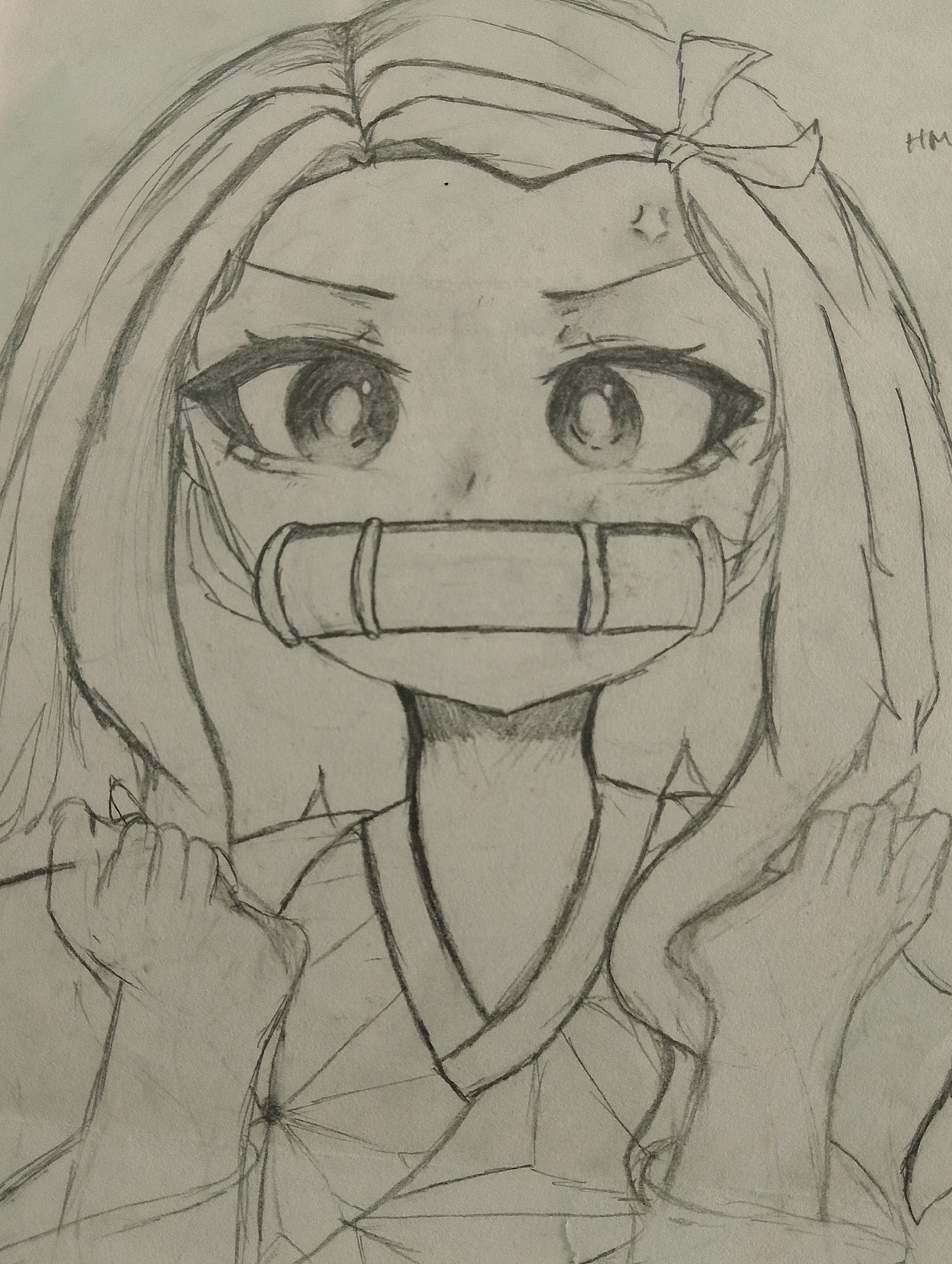 The image is a pencil sketch of an anime-style character, likely Nezuko Kamado from Demon Slayer. The character has large eyes, long hair tied with a ribbon, and a bamboo muzzle. They are wearing a traditional Japanese kimono. The sketch is detailed, focusing on the character's facial features and upper body. There are no elements in the image that indicate a specific location in Serbelawan, Indonesia, or any urban environment.