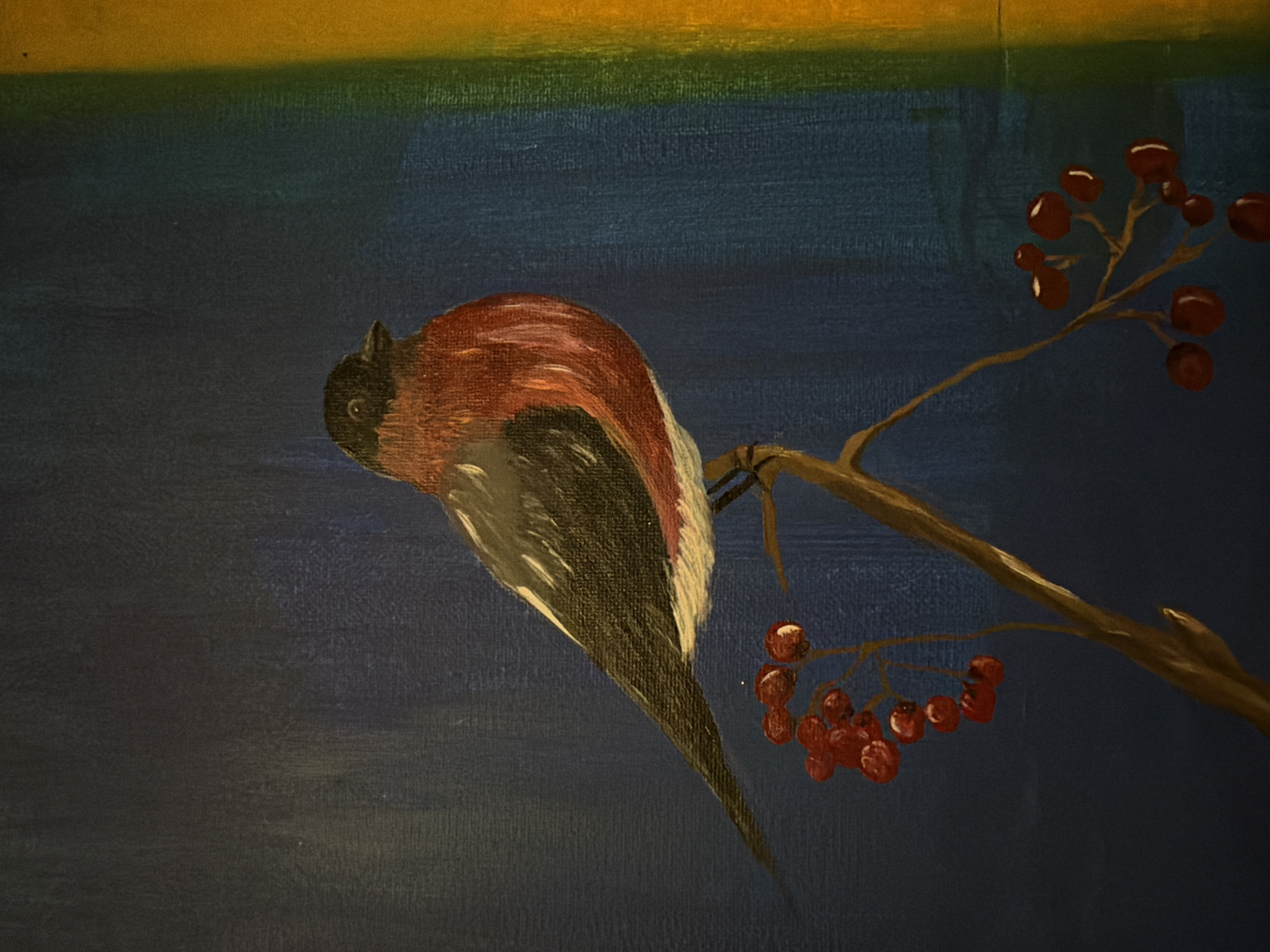 A painting depicts a bullfinch perched on a branch with red berries. The background is a dark blue with a vertical gradient of green and yellow on the right side. The bird has a black head and back, with a reddish-orange breast and white underparts. The berries are a deep red and cluster on thin brown stems. The style is realistic with visible brushstrokes. The location is unknown.
