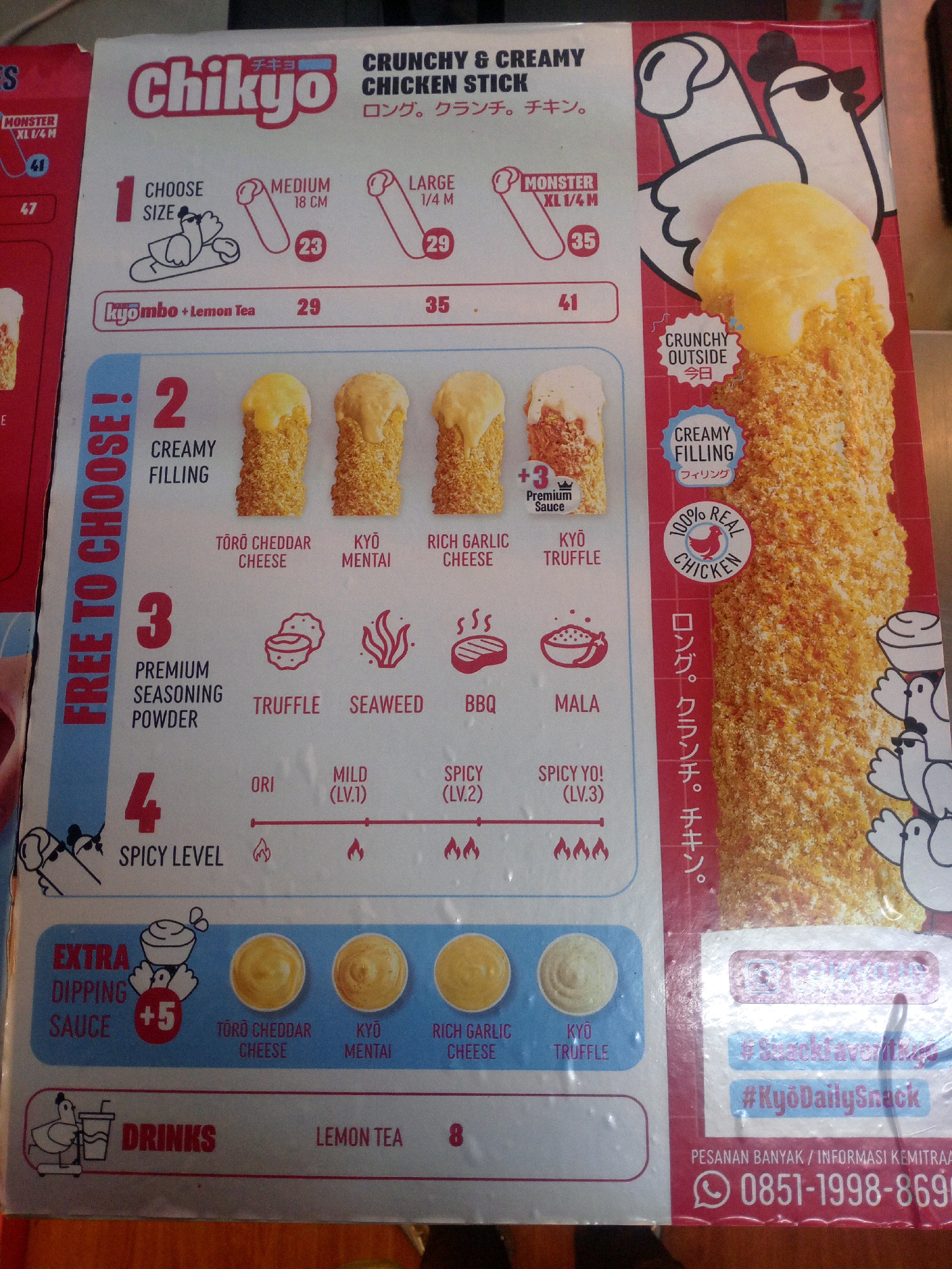 The image is a product advertisement for "Chikyo Crunchy & Creamy Chicken Stick". It displays a menu with various options for customization, including size, filling, seasoning, and spice level. There are illustrations of chicken characters and the chicken sticks themselves. The advertisement also includes promotional hashtags and contact information for inquiries or bulk orders. The text is primarily in English and Japanese, with some Indonesian phrases. The overall presentation is colorful and engaging, typical of fast-food marketing. There is no indication of a specific location in Bekasi, Indonesia.