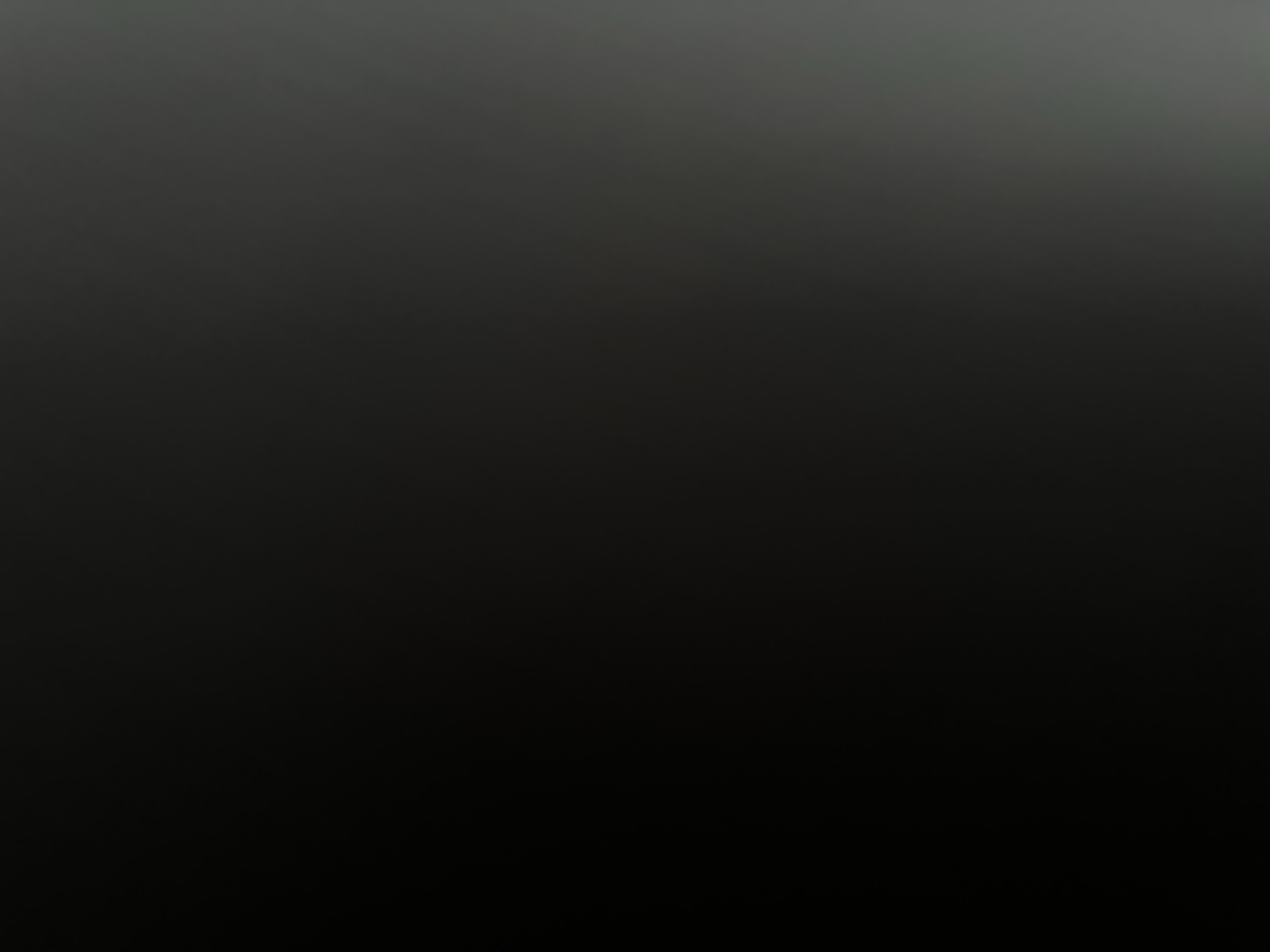 This media file is a still image, predominantly black with a subtle gradient effect, transitioning from a dark grey at the top to a deep black at the bottom. There are no discernible subjects, objects, or scenes visible within the frame. The image is uniformly dark, suggesting it might be an intentional artistic choice for background, a technical error, or a placeholder. No activity or event is taking place. There are no notable details such as time of day, weather, location cues, or emotions conveyed by the image. Similarly, no text is visible. The provided context of "Zvezdara Urban Municipality, Serbia" does not offer any visual cues that can be identified in the image itself.