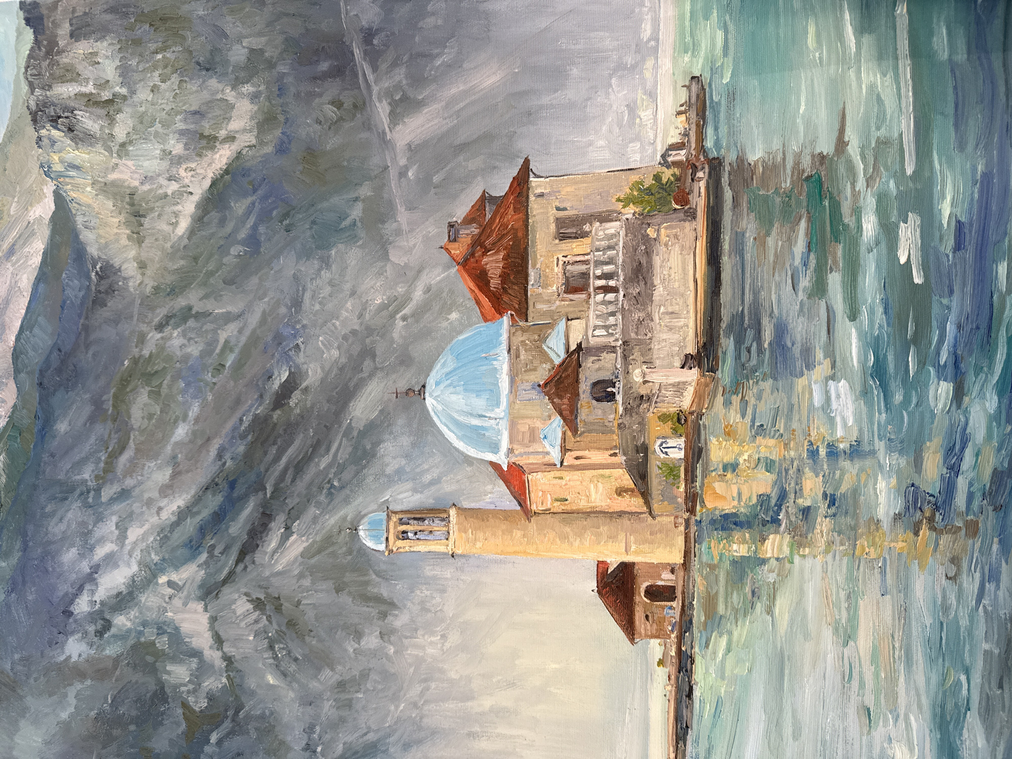 The image is a painting of a coastal scene featuring two islands with structures, set against a backdrop of mountains and water.
The islands appear to be small and built-up with buildings, including churches with domes, one with a distinctive blue dome. The structures have a mix of architectural styles, with light colored walls and red roofs.
The water surrounding the islands is depicted with vertical brushstrokes in shades of blue, green, and white, suggesting a reflection of the buildings and sky.
In the background, there are tall mountains rendered with gray and blue tones. The sky is overcast, with a gray and cloudy appearance.
The style of the painting is impressionistic, with visible brushstrokes and a focus on capturing the light and atmosphere of the scene.
