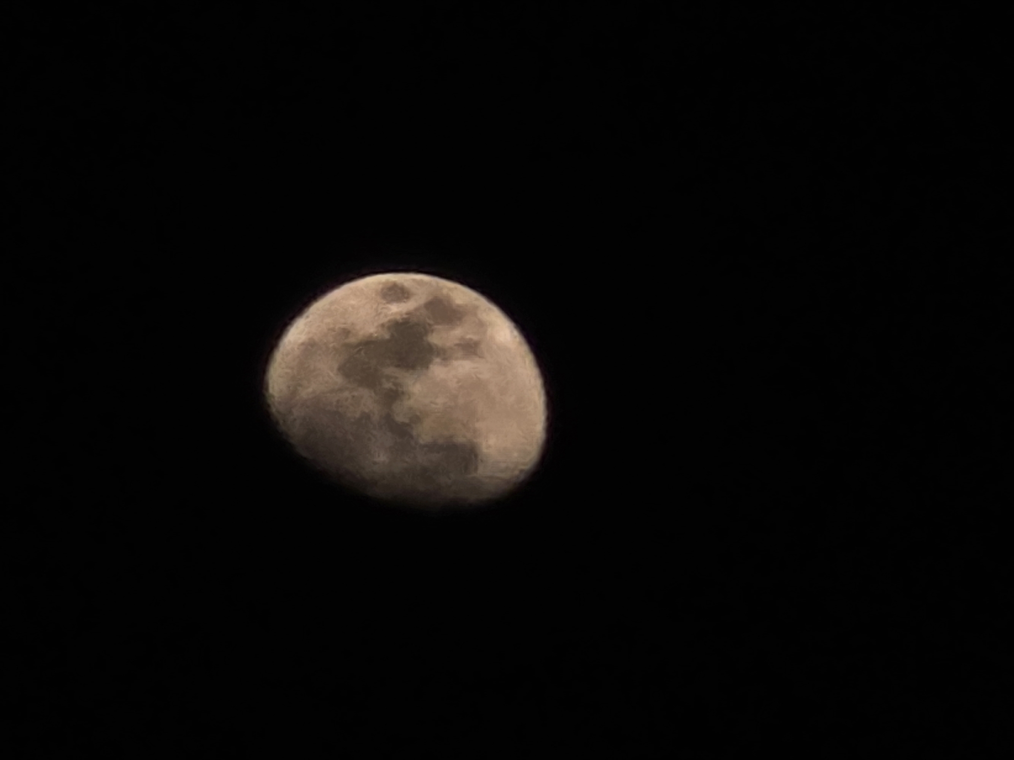 A full moon is visible against a dark night sky. The moon is partially illuminated, showing craters and surface features. The image is a close-up of the moon, with no other objects or environmental details visible in the frame. The location in Yambol, Bulgaria is not discernible from the image itself.