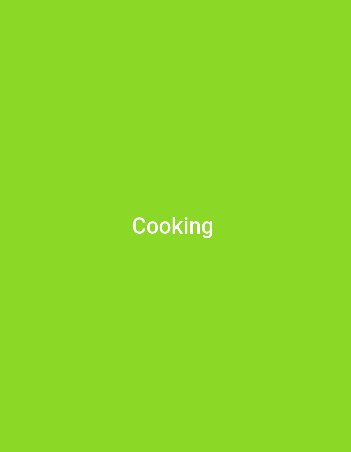 The image is a bright green, solid-color background. Centered on the background is the word "Cooking" written in white, sans-serif text. There are no other objects or subjects present in the image. The location in Sabon Tasha, Nigeria, is not depicted in this image.