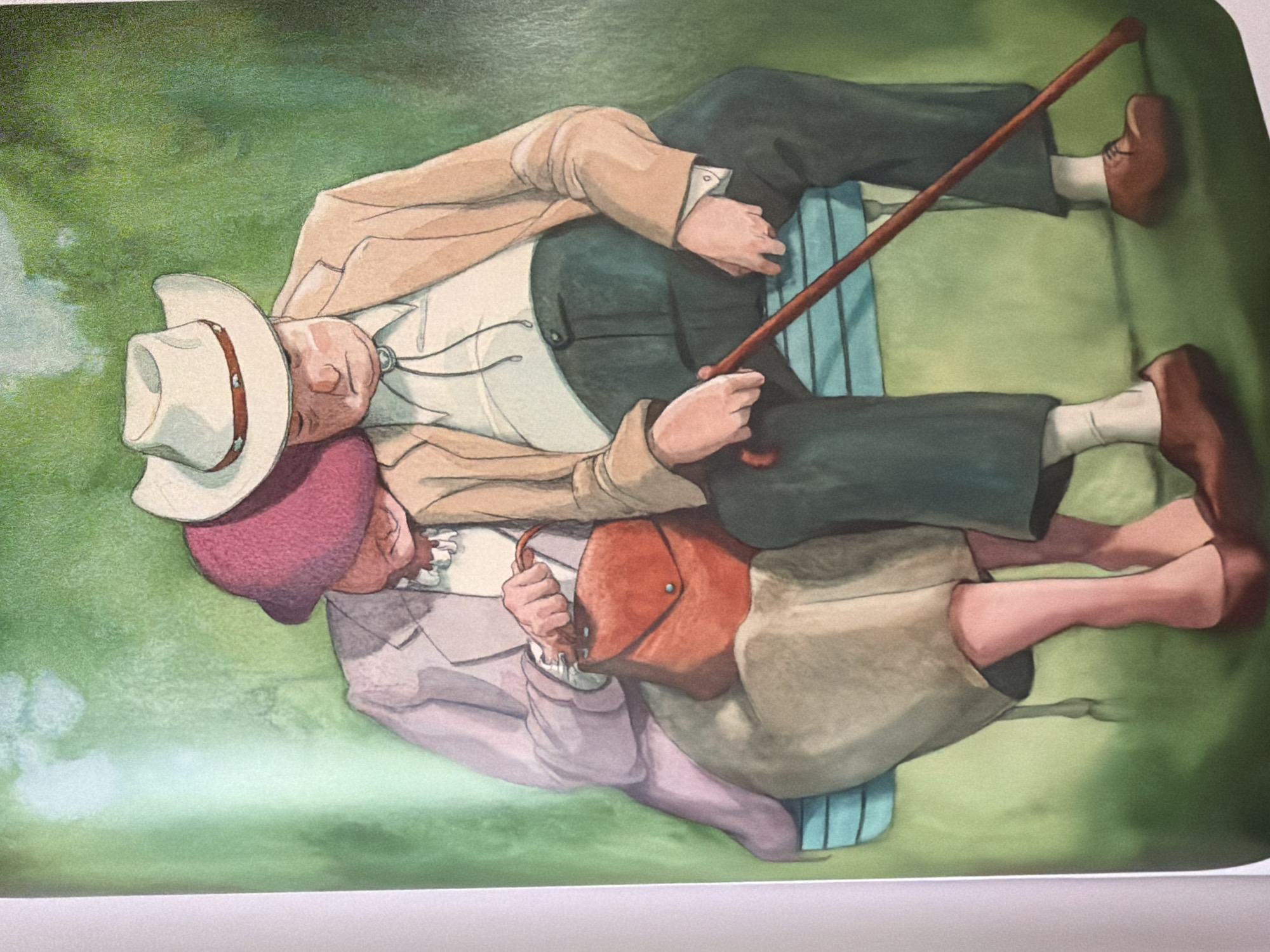 Two elderly individuals, a man and a woman, are seated closely on a light blue slatted bench in an outdoor park setting within Pazardzhik, Bulgaria. Both appear to be dozing or sleeping, with the woman's head resting on the man's shoulder. The woman, positioned on the left, wears a deep pink cloche-style hat, a light purple blazer over a white blouse with a prominent white frilled necklace, and a light brown skirt. She clutches a reddish-brown leather purse with a flap closure in her right hand. The man, on the right, wears a white cowboy hat with a patterned brown band, a light tan blazer over a white shirt with a bolo tie, and dark trousers. He holds a dark red walking stick diagonally across his lap with both hands. The background is composed of soft, blurred green foliage and grass, characteristic of a natural, cultivated outdoor space.
