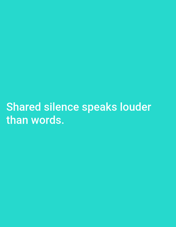 The image is a close-up of a text overlay on a solid teal background. The text, in white sans-serif font, reads "Shared silence speaks louder than words." There are no discernible people, subjects, objects, actions, or interactions in the image. The environment is a plain, untextured background. The location in South Jakarta, Indonesia is not identifiable from the visual information provided.