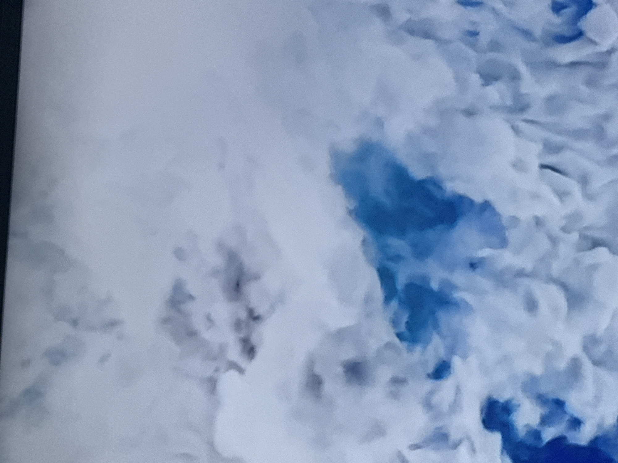 The image shows a cloudy sky with patches of blue. The cloud formation is dense and covers most of the frame. No specific information suggests the location is in Mytishchi, Russia. No people, subjects, objects, actions, or interactions are depicted. The environment consists of a cloudy sky.