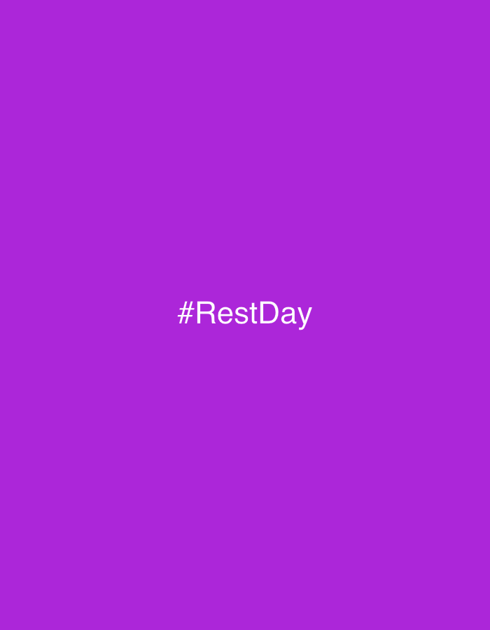 The image is a solid field of purple color. Centered horizontally and vertically on the image is the text "#RestDay" in white. The text is simply formatted and the hashtag is included.