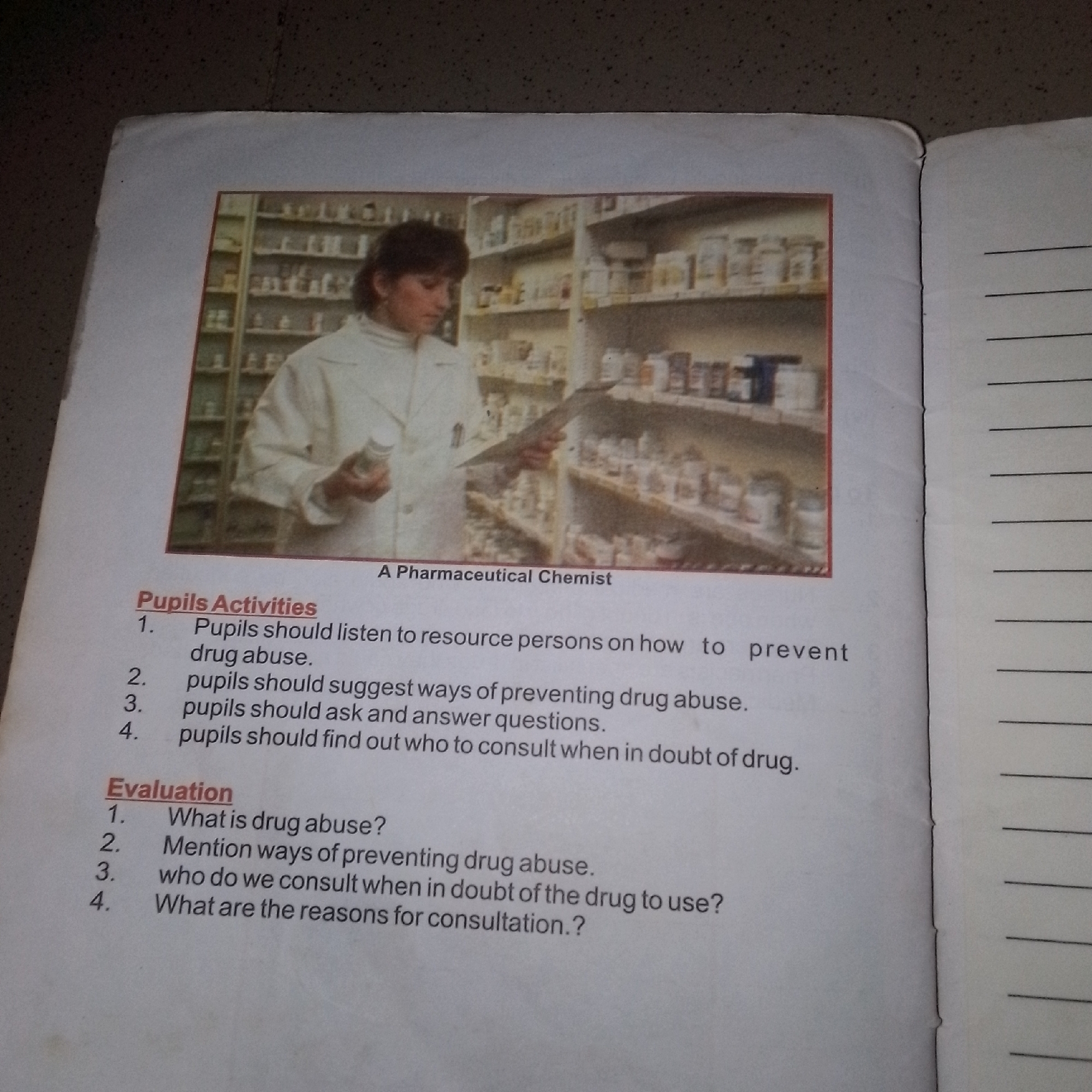 The image shows a page from a book. The top portion of the page features a photograph of a woman in a lab coat holding a bottle and looking at a shelf of pharmaceuticals. Below the photograph, there is text divided into two sections: "Pupils Activities" and "Evaluation." The "Pupils Activities" section lists four numbered points detailing recommended actions for pupils related to drug abuse. The "Evaluation" section contains four numbered questions about drug abuse. The image is a close-up, top-down view of the book page, with the right side of the page showing faint horizontal lines, possibly for handwriting. There is no indication of the location being Jalingo, Nigeria.