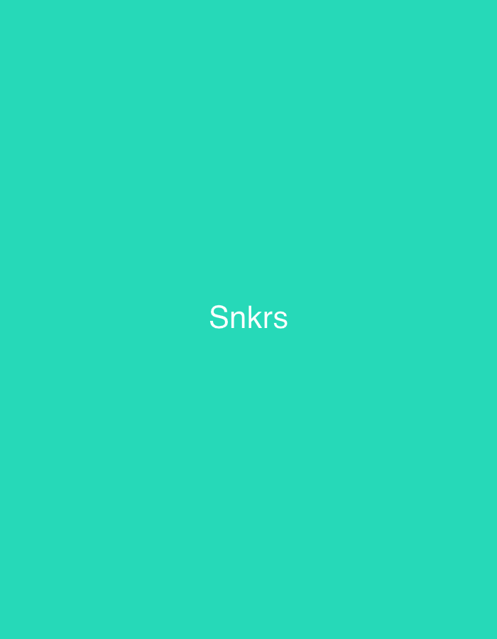 This image, associated with the city of Casablanca, Morocco, displays a minimalist composition. It features a uniform, vibrant teal background. Centered horizontally and slightly above the vertical midpoint of the frame, the white sans-serif text "Snkrs" is prominently displayed. No other objects, figures, actions, or environmental details are visible within the frame.