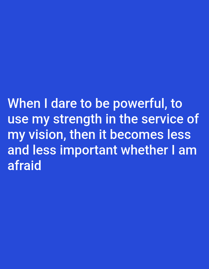 The image contains a quote in white text against a royal blue background. The quote reads: "When I dare to be powerful, to use my strength in the service of my vision, then it becomes less and less important whether I am afraid". There are no people, objects, or discernible environmental features in the image. The image is not located in Bukuru, Nigeria.