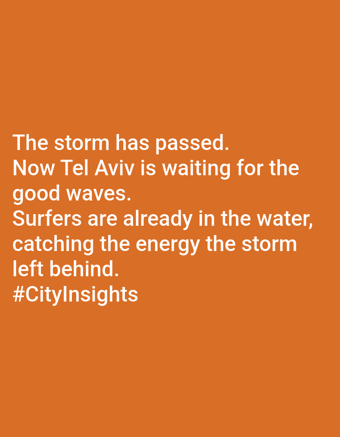 The image is a graphic with an orange background and white text. The text reads: "The storm has passed. Now Tel Aviv is waiting for the good waves. Surfers are already in the water, catching the energy the storm left behind. #CityInsights" The image conveys a message about the city of Tel Aviv, Israel, and the activity of surfers in its waters after a storm.