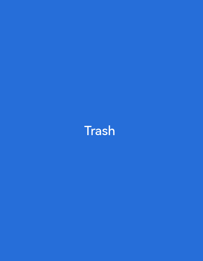 The image shows the word "Trash" in white, capitalized letters centered on a solid blue background. There is no discernible city or location information.
