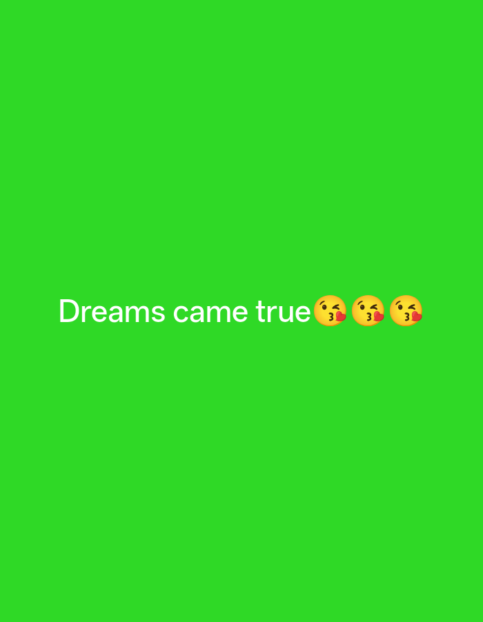 A bright green screen displays the text "Dreams came true" in white, followed by three kissing face emojis.