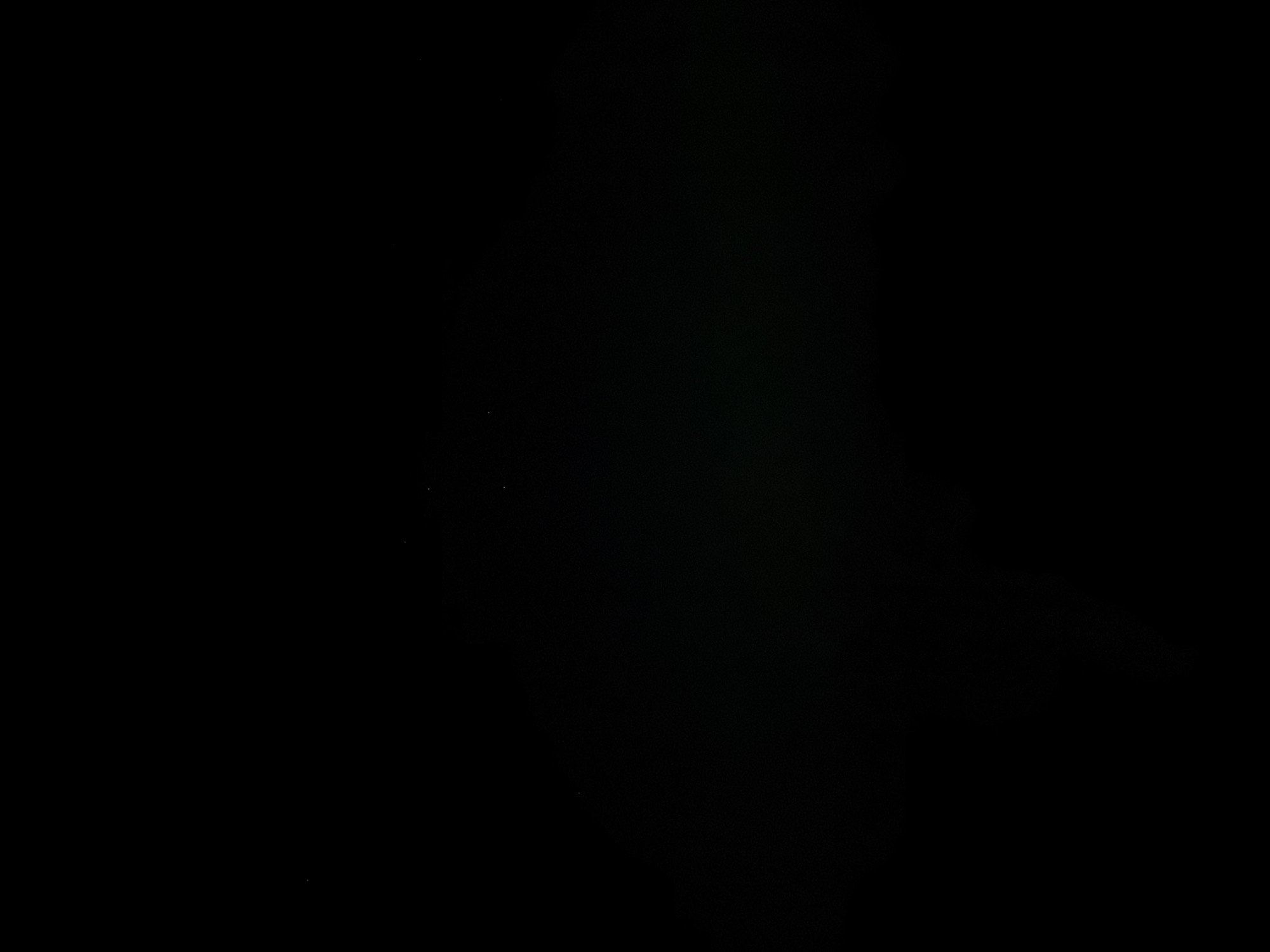 The image is completely black and devoid of any discernible details. It is impossible to describe the location, people, subjects, objects, actions, interactions, or the environment. The image contains no forensic evidence.