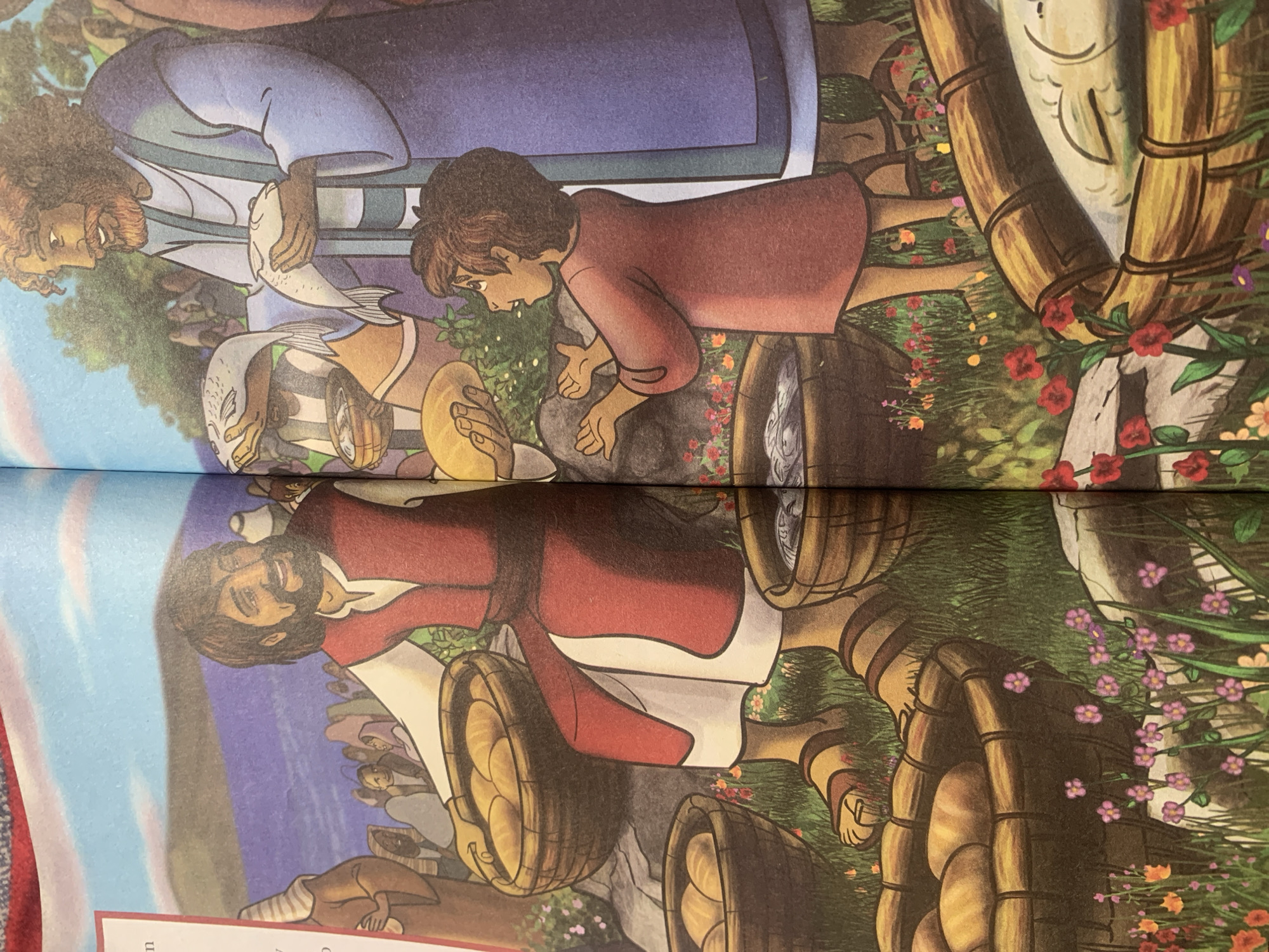 The illustration depicts a scene of abundance, likely a religious or historical narrative, with a focus on food distribution. In the foreground, several woven baskets are filled with bread and fish. One large basket overflowing with loaves of bread sits prominently to the left, and another basket containing fish is visible on the far right.
In the center of the image, a man with a beard, wearing a red vest over a white tunic and sandals, is seated and holding a basket of bread. He appears to be interacting with a young boy dressed in a reddish-brown tunic who is reaching towards him with open hands. Behind them, a taller man in a blue robe is standing, holding two fish. He is also interacting with the young boy. A crowd of people in the background are observing the scene, some holding baskets themselves.
The environment is lush and green, with scattered wildflowers in shades of pink, red, and orange. The ground is covered in grass, and there are large rocks visible. In the distance, a body of water and rolling hills are depicted under a bright blue sky with wispy clouds. The overall impression is one of a communal gathering and sharing of resources.
There is no information in the image to suggest a location in the city of Jauro Yinu, Nigeria.