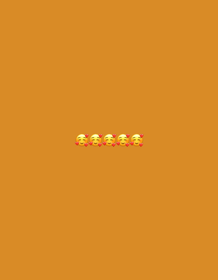A row of five yellow smiling emojis with rosy cheeks and red hearts floating around their faces are centered on an orange background.