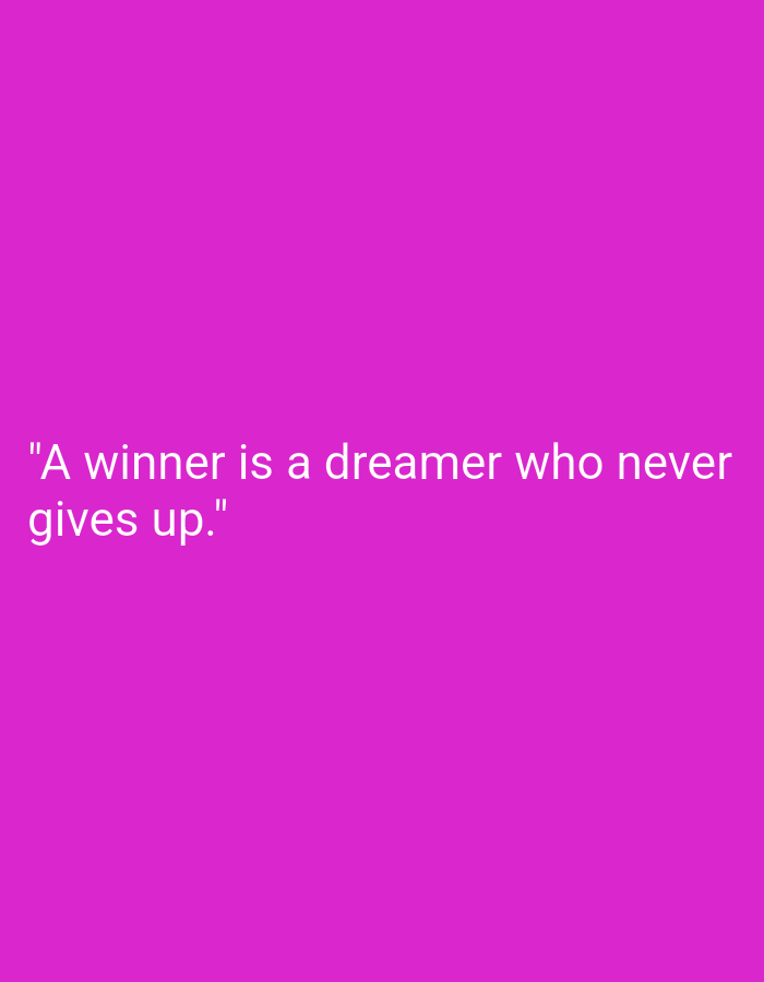 The image is a photograph with a bright pink background. In the center of the image, white text is displayed. The text reads: "A winner is a dreamer who never gives up." There are no people, objects, or environmental details present in the image, other than the text and background. The location in Peterongan, Indonesia is not depicted or suggested by the image content.