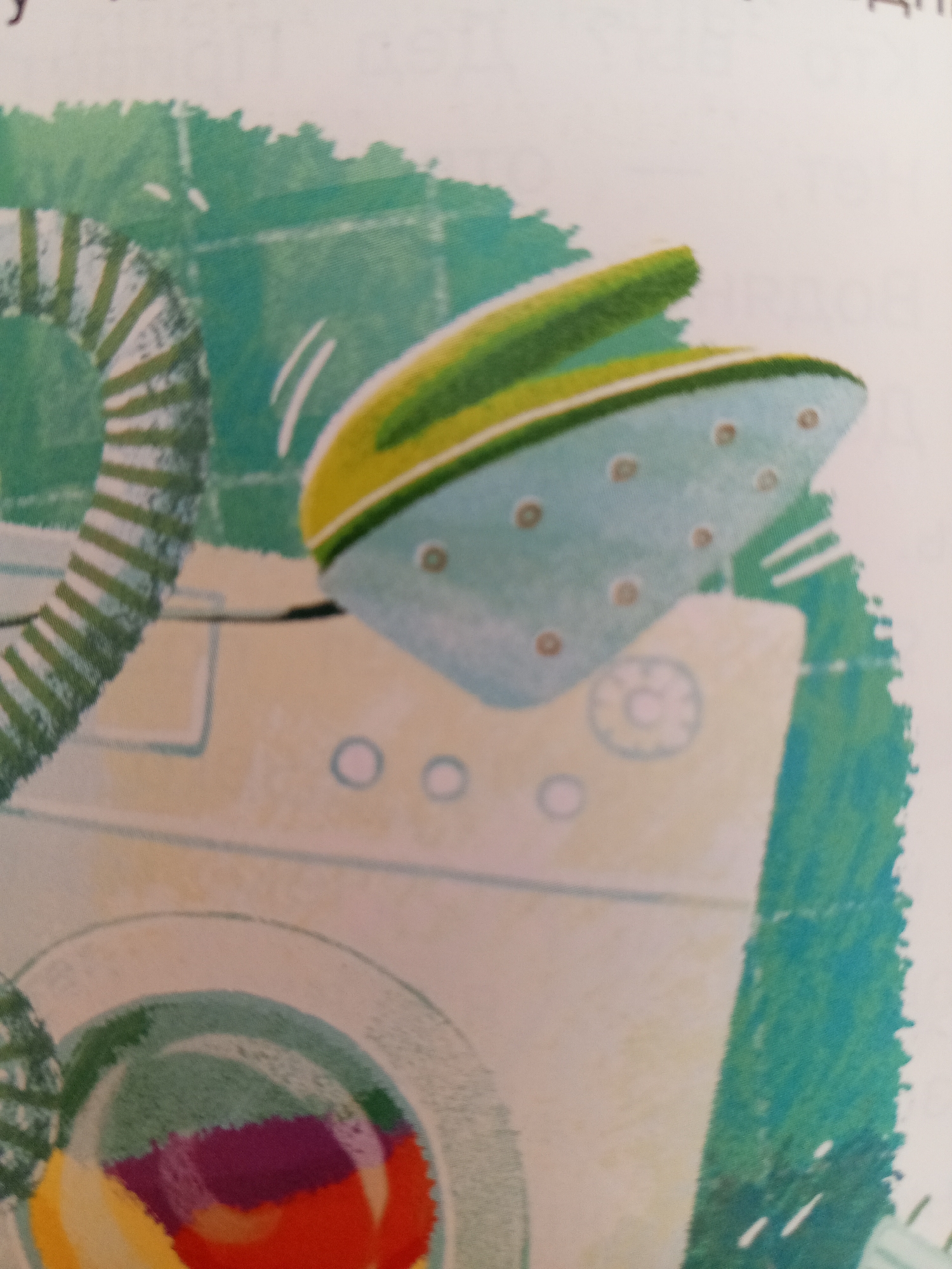 This is a close-up, low-angle, eye-level, medium shot illustration of a washing machine. The washing machine is light cream colored and has a round, clear door in the foreground which contains brightly colored laundry inside, including red, purple, and yellow. Above the washing machine, a light blue iron with green accents is perched on the top edge. A ribbed, green hose is seen on the left side of the washing machine, extending upwards out of frame. The background is a blurry, teal green, textured surface, possibly a wall. There is no indication of the city of Chistopol, Russia, or any other location.
