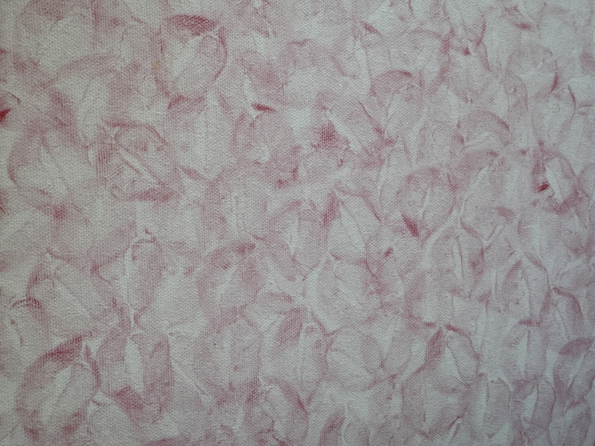 The image displays a close-up, abstract view of a textured surface with a pattern of smudged pink or red marks. The texture appears to be fabric or paper with a woven appearance. The marks are irregular in shape and vary in intensity, creating a mottled or watercolor-like effect. There are no discernible objects, people, or environmental features. The location of this image in Unknown, Russia, is not ascertainable from the visual information provided.