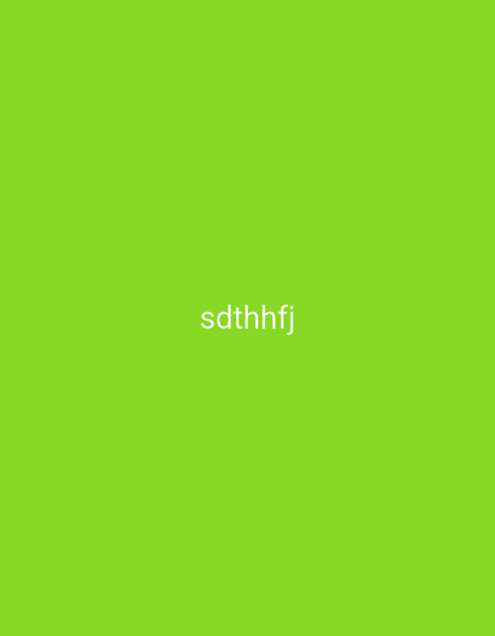 The image displays a plain, solid lime green background. In the center of this vibrant green field, the word "sdthhfj" is prominently featured in white, sans-serif, lowercase letters. There are no people, objects, or a discernable scene or setting beyond the colored background and the text itself. No activity or event is taking place; it is a static graphic image. Notable details are scarce due to the minimalist nature of the image. There are no indications of time of day, weather, or specific location cues within the image. Emotions are not conveyed. The only visible text is "sdthhfj". While the location context of Yerevan, Armenia was provided, the image itself offers no visual elements to suggest this specific geographical setting.