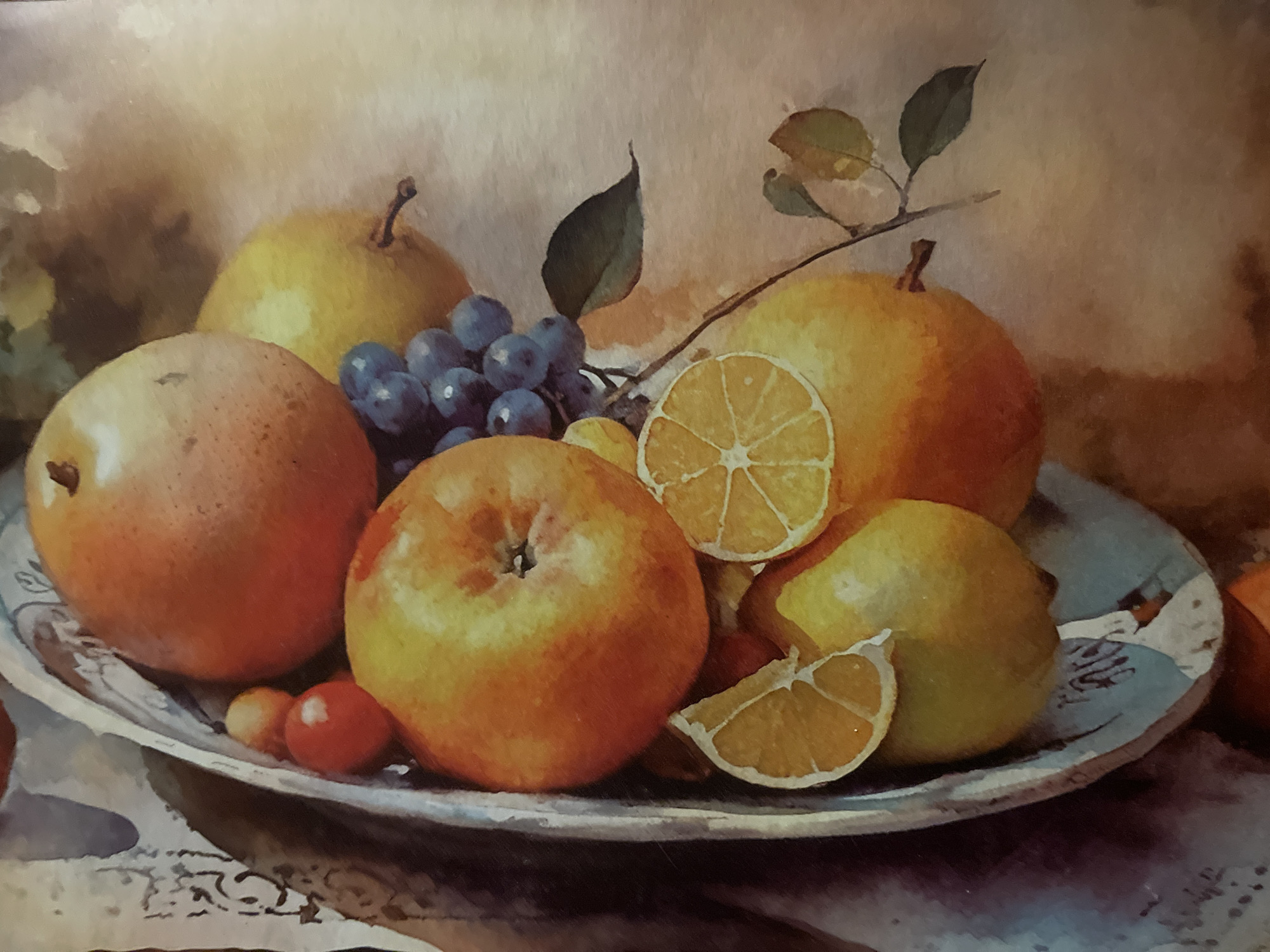 This is a still life painting, likely watercolor, depicting a collection of fruits in a bowl. The fruits include apples, oranges, pears, grapes, lemons, and what appear to be cherries or small berries. The bowl itself is ornate and textured. The background is softly rendered with muted, earthy tones, suggesting a diffused light source. There are no people, actions, or interactions depicted. The style is impressionistic with visible brushstrokes. The image is a painting and therefore has no specific location in the city of Minsk, Belarus.