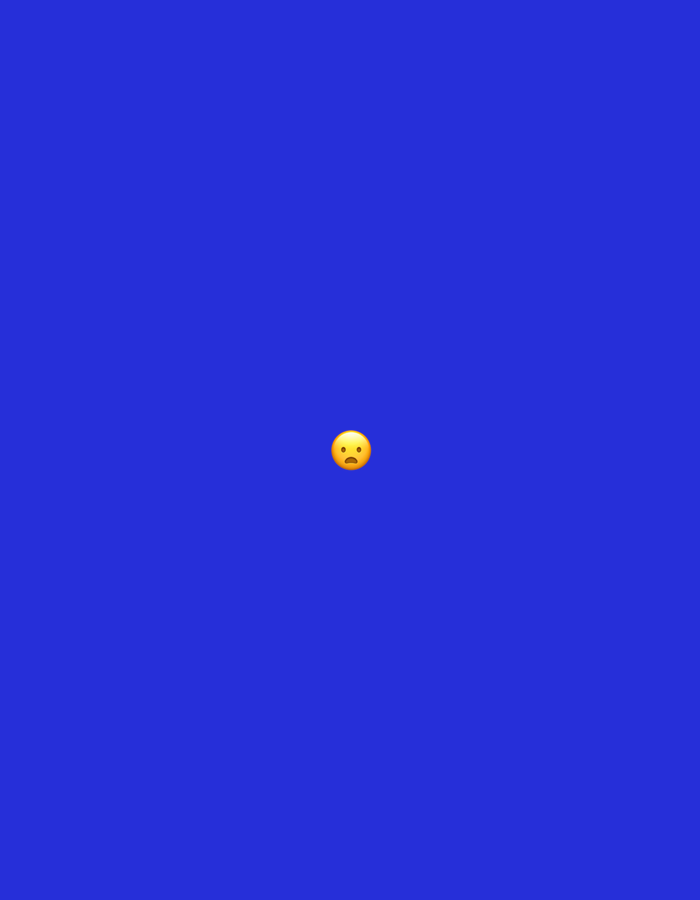 The image displays a single, yellow, round emoji against a solid, uniform royal blue background. The emoji is positioned centrally within the frame. It features wide-open black eyes, a small, open 'o'-shaped mouth, and subtle red blushing on its cheeks, conveying an expression typically associated with surprise, shock, or worry. There are no other discernible subjects, objects, or environmental details present. The image contains no visual information that would allow for the determination of a specific geographical location, including any area within the city of Santa Ana, Venezuela.
