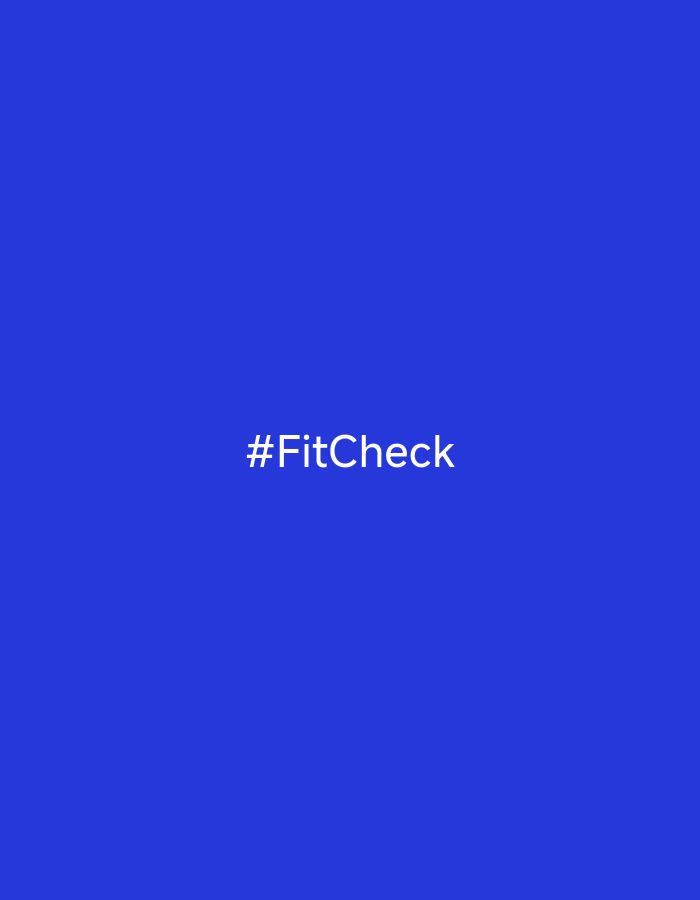 The image is a blue square with the text "#FitCheck" in white centered within the square. The image does not depict a location in Chaikovsky, Russia, or contain any details related to people, objects, actions, interactions, or the environment beyond the color and text.