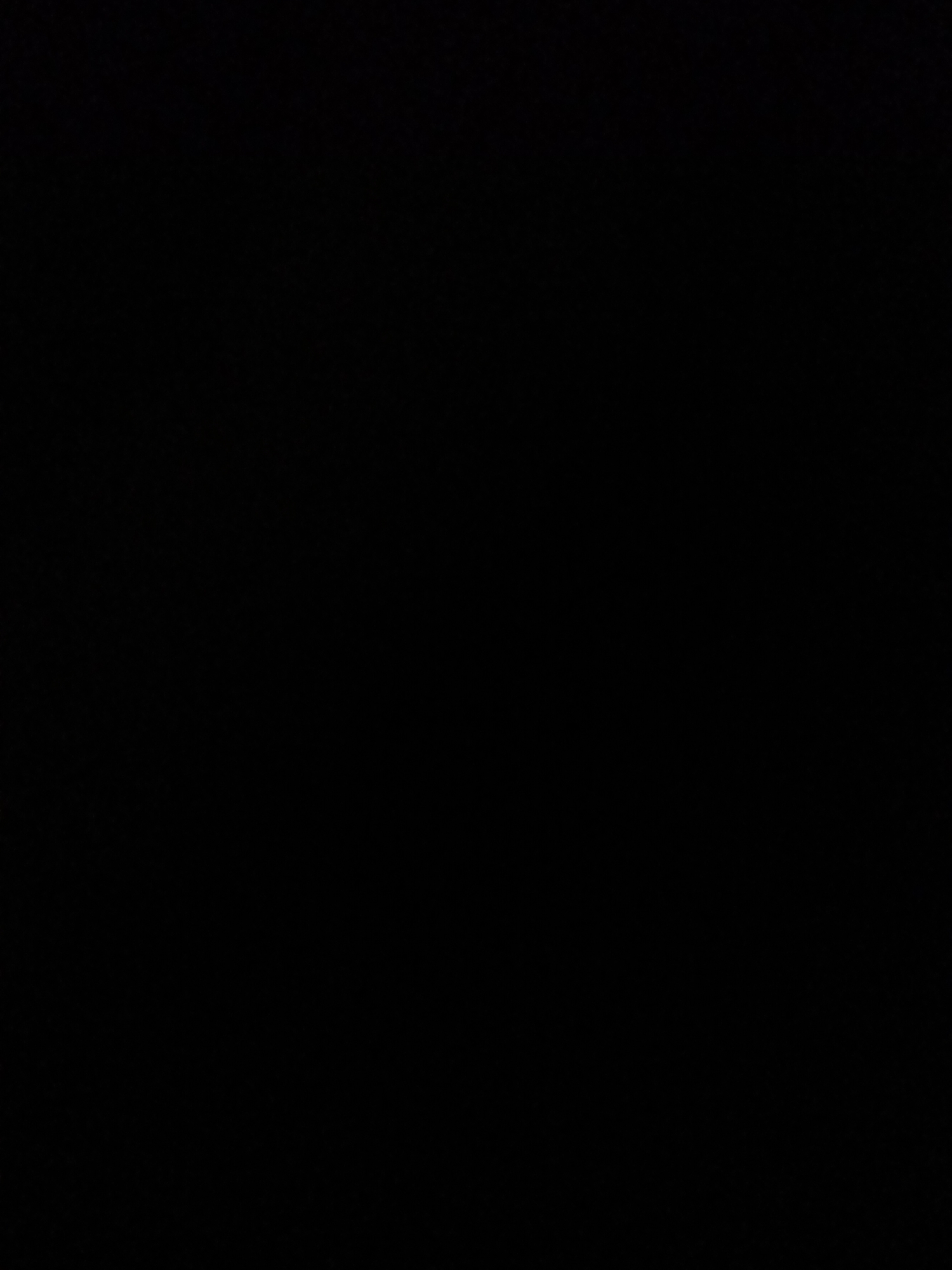 The image is a black silhouette of what appears to be a monument or sculpture. The subject is abstract, with geometric shapes and sharp angles. There are no discernible people, objects, or scene details, and the setting is completely obscured by the darkness of the silhouette.
The activity or event taking place is not evident from the image. There are no notable details such as time of day, weather, or location cues. The silhouette provides no information about emotions. There is also no visible text within the image.
Without any discernible features, it is impossible to provide further details about the subject or context. The image is entirely black, making any interpretation speculative.