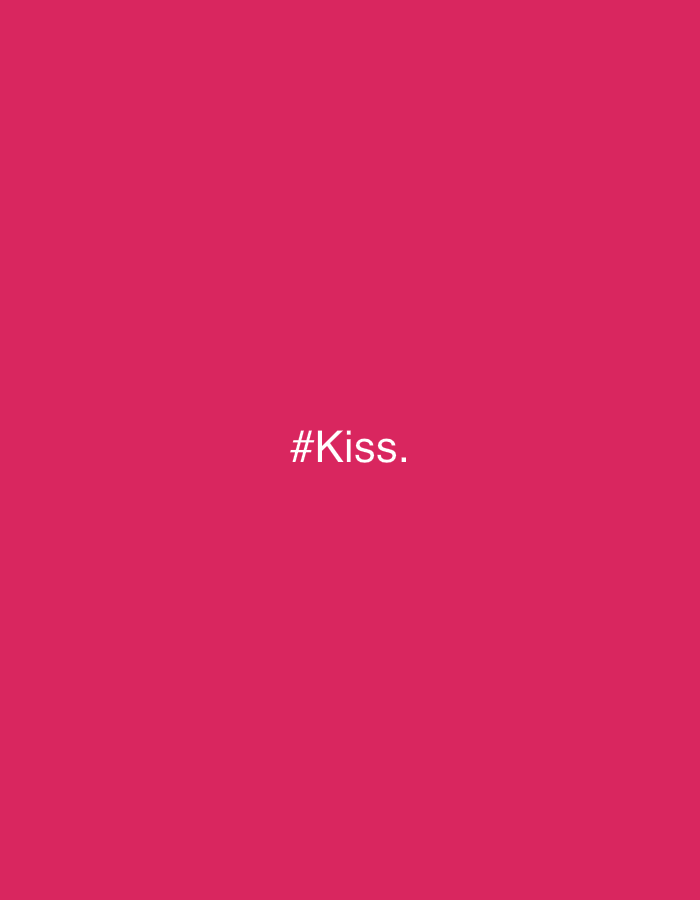 The image is a solid crimson background with the white text "#Kiss." centered.