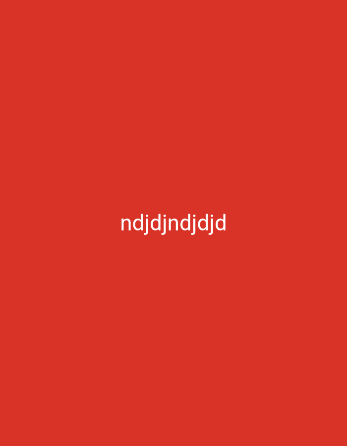 The image displays a solid red background with white text centered horizontally. The text reads "ndjdindjdjd". There is no discernible location in the city of Nsugpe, Nigeria, or any other identifiable urban setting. The image contains no people, subjects, objects, or actions.
