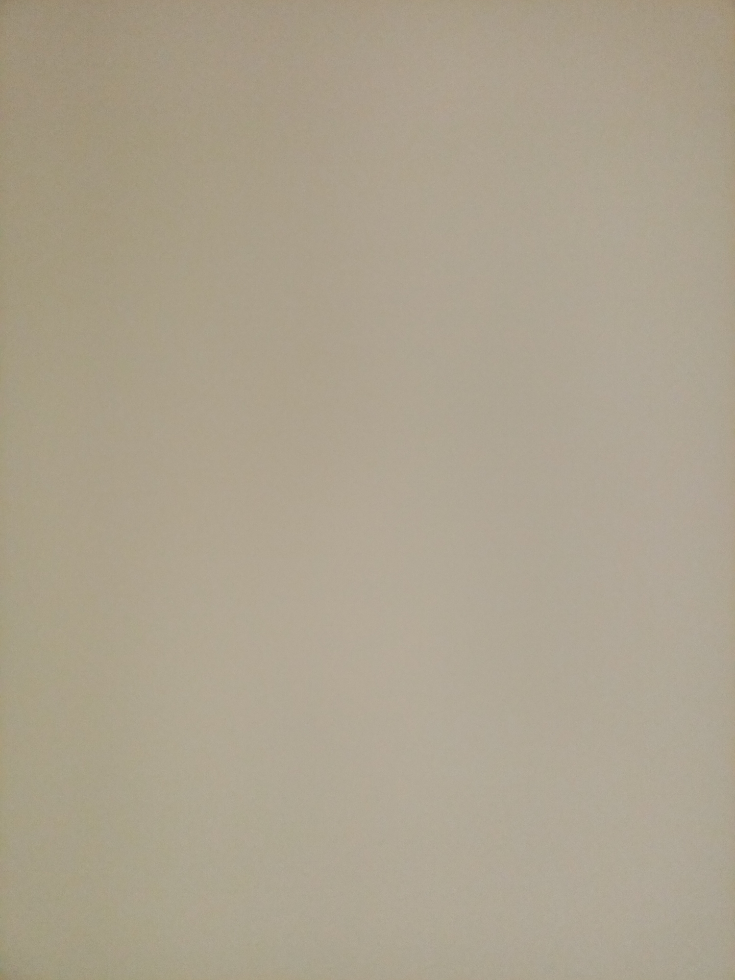 The image depicts a plain, light beige wall. There are no discernible objects, people, or distinguishing features present in the scene. The lighting is even and diffused, suggesting an indoor environment. The wall's surface appears smooth and uniform. The image is a close-up, filling the frame with the texture and color of the wall. There is no indication of the location within Rostov-on-Don, Russia, or any specific context.