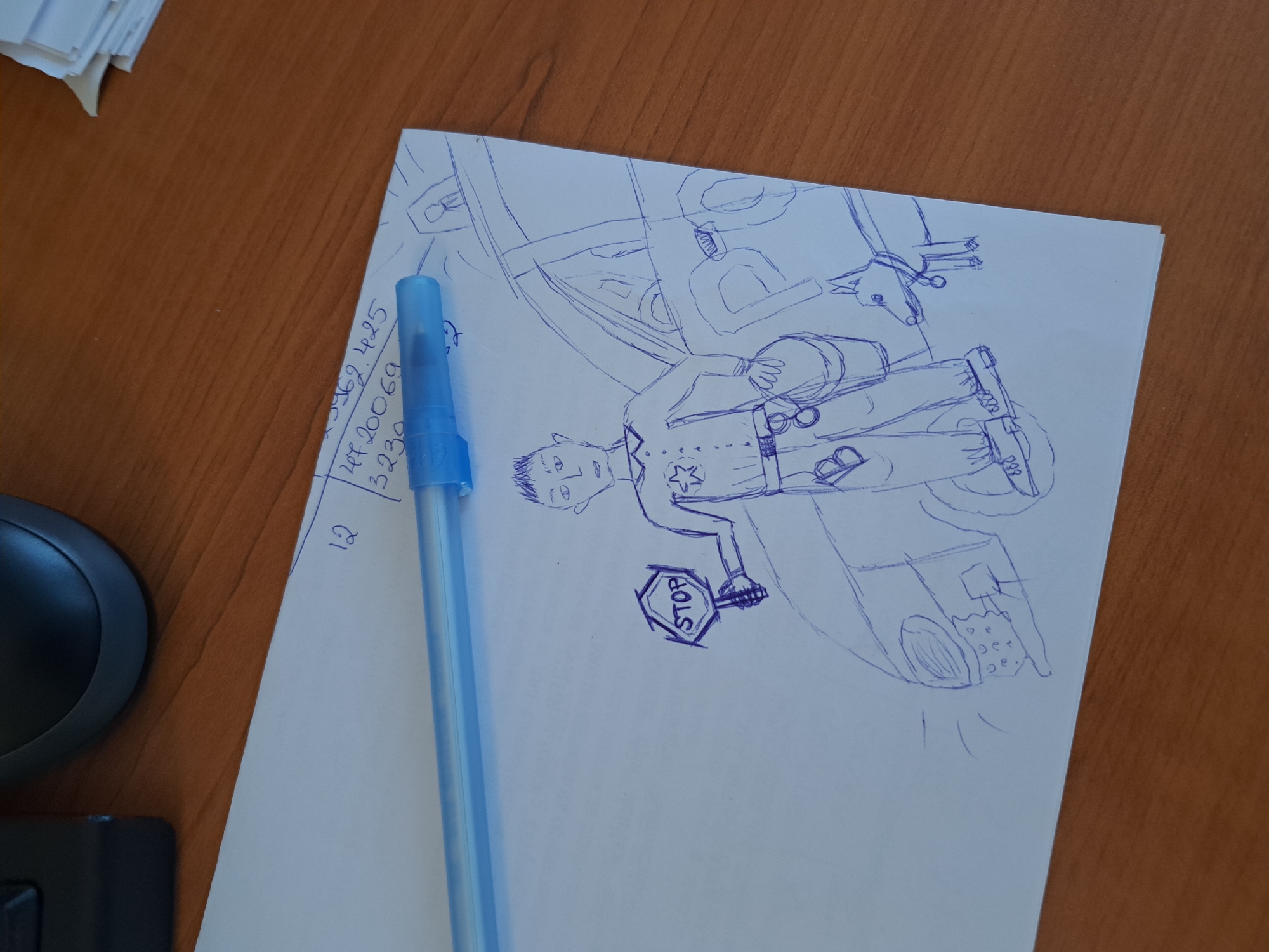 An overhead shot captures a light blue pen resting on a white sheet of paper that displays a blue ink sketch. The paper lies on a warm-toned wooden desk with a visible grain. To the left of the paper, parts of a black computer mouse and another black device are visible. In the upper left corner of the desk, a stack of white papers is neatly piled.
The drawing on the paper depicts a stylized human figure, likely a male, wearing what appears to be a uniform with a star emblem on the chest. The figure has short, spiky hair and is holding a hexagonal "STOP" sign. The word "STOP" is clearly written in capital letters within the sign. The character stands in front of an abstract background that suggests a vehicle or structure, possibly a boat or a car, with some indistinct shapes and lines.
In the upper left section of the paper, next to the pen, a series of handwritten numbers are visible: "5962.425", "447.20069", "3230", and below them, "12". The image is taken indoors, with soft, even lighting.
