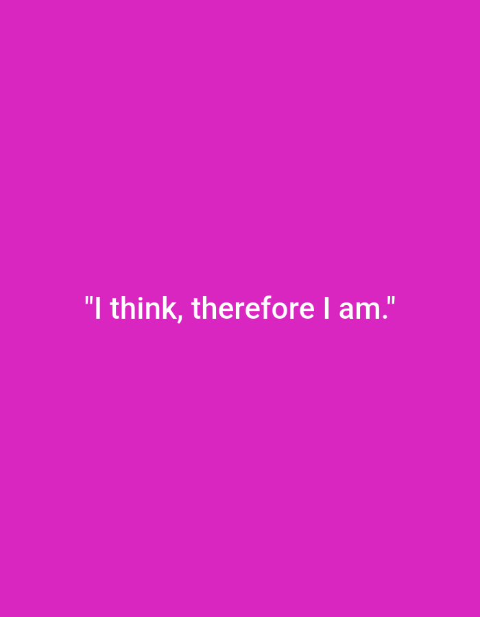 The image is a plain, bright pink background with white text centered on it. The text reads: "I think, therefore I am." There are no people, objects, actions, or interactions depicted in the image. The image does not contain any information or visual cues that could be used to determine its location in Nowa Wieś Książęca, Poland, or any other city.