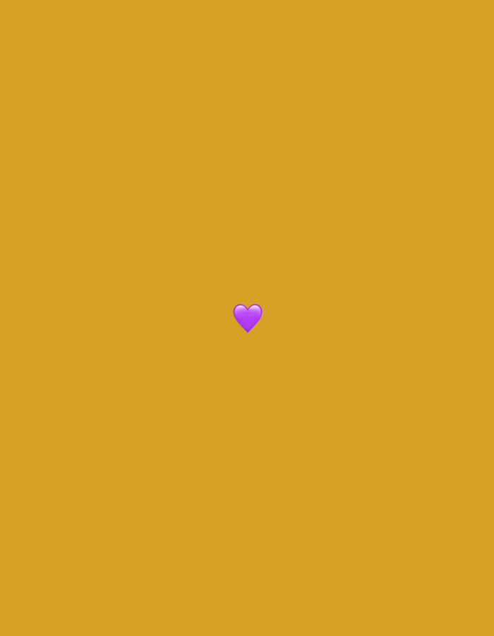 A purple heart emoji is centered on a golden-orange background. No specific location in Moscow, Russia can be determined from the image.