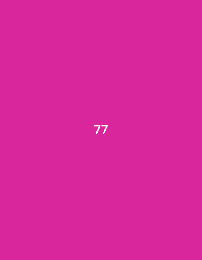 The image is a solid pink color with the number "77" in white centered on the screen. It is impossible to determine the location of the image based on latitude and longitude coordinates. There are no people or objects present.