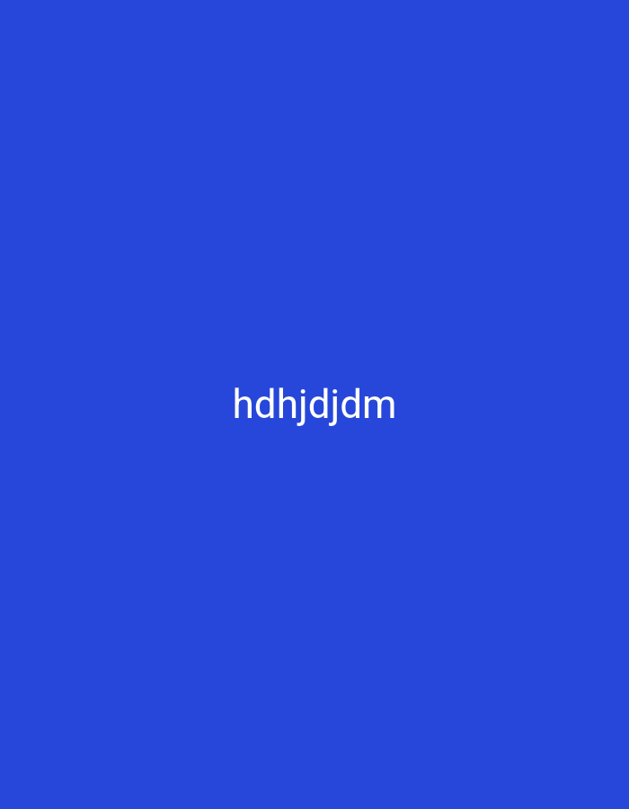 The image is a solid royal blue background with the text "hdhjdjdm" centered horizontally and vertically in white. There are no people, objects, actions, interactions, or environmental details that would suggest a location in Nsugpe, Nigeria or any other city.