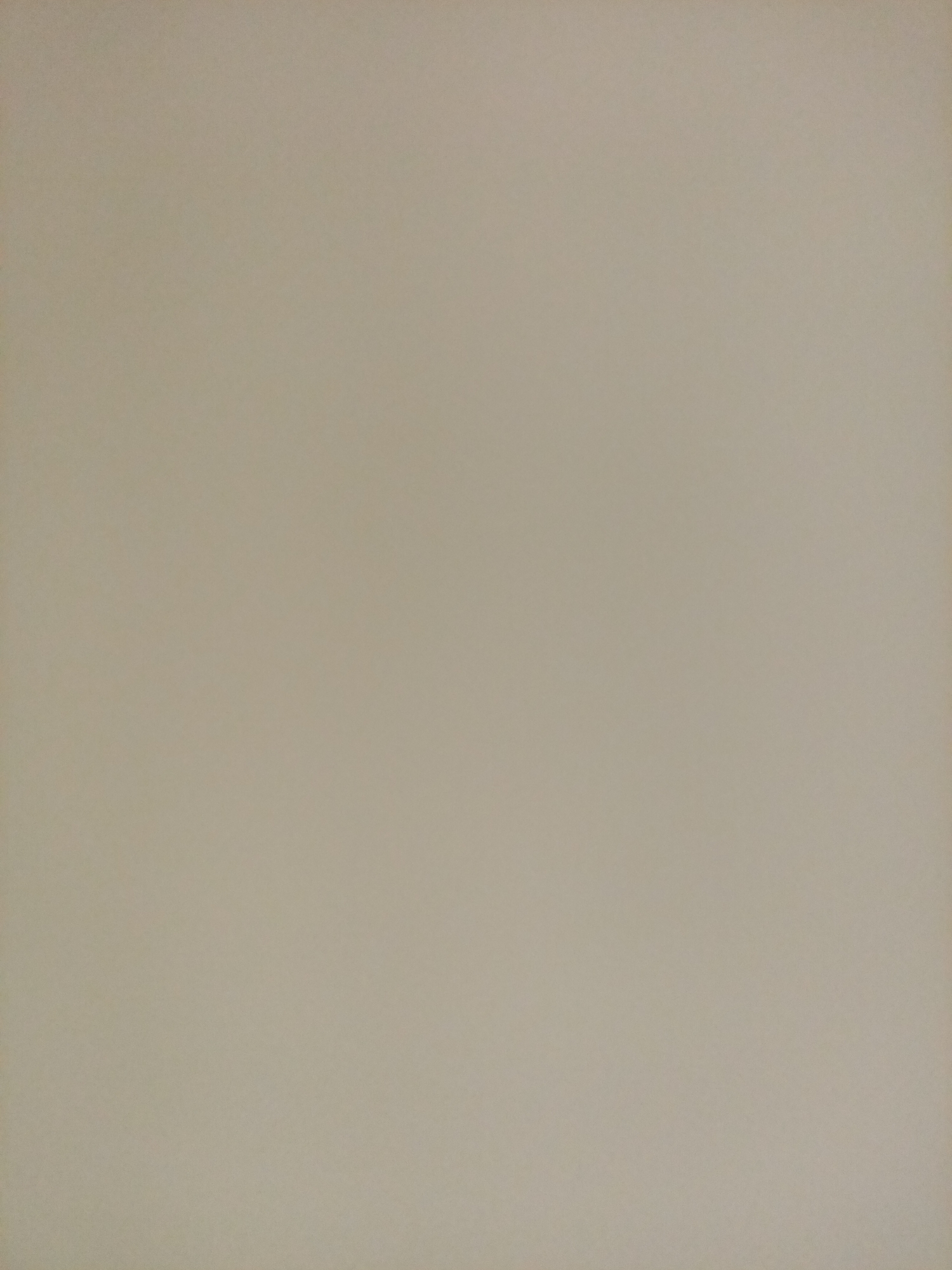 The image is a plain, textured background. There are no discernible objects, people, or environmental features present. The color is a muted, neutral beige. The image does not provide any information that could be used to identify a location in Rostov-on-Don, Russia, or any other location.