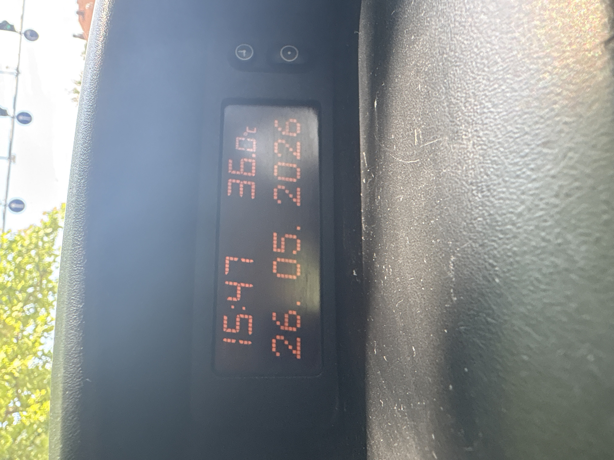 The image shows an in-vehicle display panel, with the screen displaying "15:47" (time), "26.05.2020" (date), and "36.9 C" (temperature). The location appears to be Plovdiv, Bulgaria, based on the time zone displayed. The display appears to be located inside a vehicle.