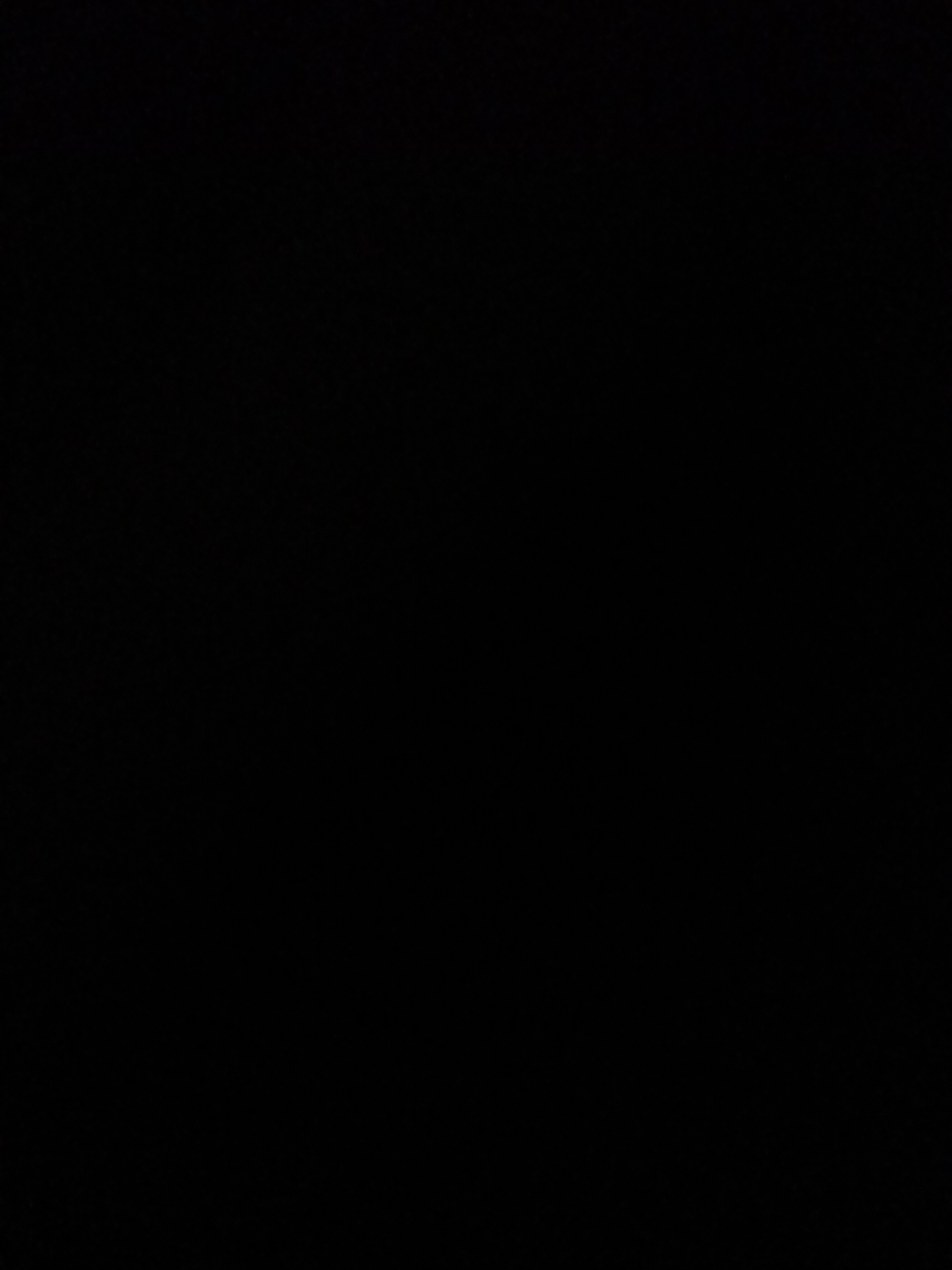 The image is a black frame with no discernible content.