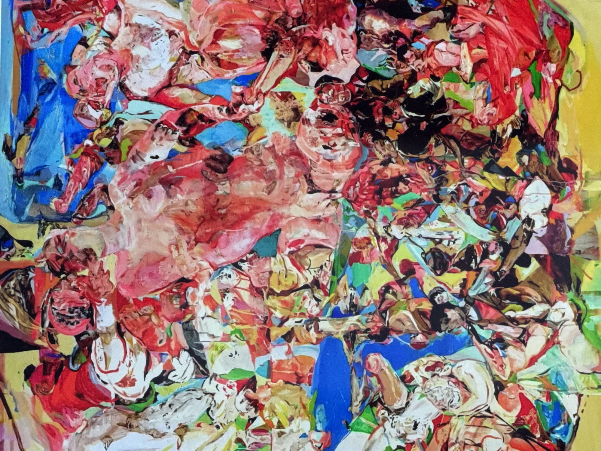 This image is an abstract expressionist painting featuring a dense, tumultuous composition of intertwined human figures and fragmented forms. The artwork is dominated by a vibrant palette of reds, pinks, and flesh tones, suggesting numerous nude or partially draped bodies. These figures are rendered with visible, heavy brushstrokes, creating a textured surface and a sense of dynamic movement.
The background and interstitial spaces are filled with contrasting blocks of vivid color, primarily bright blues, yellows, and greens, along with areas of black and white. The forms are highly stylized and distorted, making specific actions or interactions ambiguous, yet conveying an overall impression of a crowded gathering, a struggle, or an ecstatic dance. Limbs, torsos, and suggestions of heads are discernible throughout, overlapping and merging into a chaotic whole. No specific identifiable location or environment within a city like Riga, Latvia, is depicted; the scene is entirely composed of these abstract human forms and color fields.
