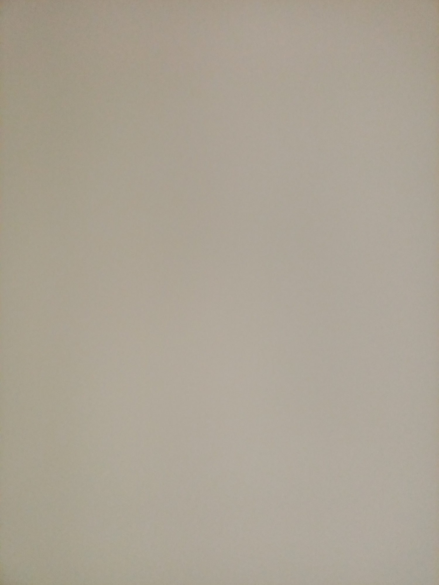 The image is a plain, light beige background with no discernible objects, people, or actions. The texture appears to be uniform, suggesting a wall or a large piece of paper. There are no elements that would allow for the identification of a specific location within Rostov-on-Don, Russia, or any other geographical context. The image lacks any details that could be used for a forensic or descriptive analysis of a scene.