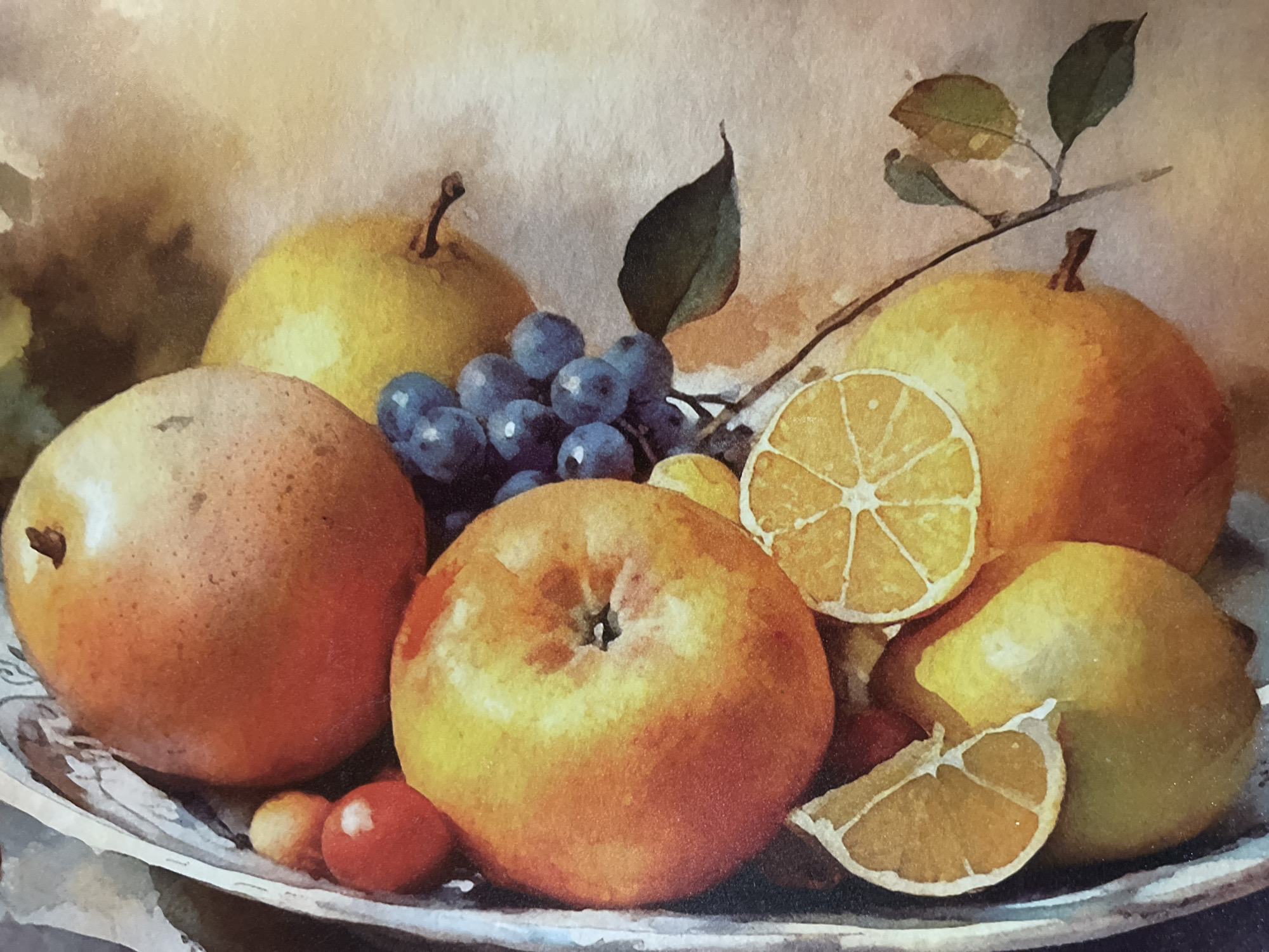 This is a watercolor painting of a fruit still life. The arrangement includes several pieces of fruit: a large, round, orange-hued fruit in the upper left, possibly an apple or pear; a bright yellow pear to its right; a bunch of dark blue grapes; a large, round, orange-red apple in the center left; and several smaller, yellow fruits that appear to be lemons, with two slices of orange visible in the foreground. The fruits are placed in a light-colored, possibly metal or ceramic, bowl or platter with a decorative edge. A thin branch with a few green leaves extends from the right side of the frame, over one of the yellow fruits. The background is a muted, textured wash of light brown and beige tones. There are no people or actions depicted in the painting. The painting does not contain any elements that would indicate its location in Minsk, Belarus.