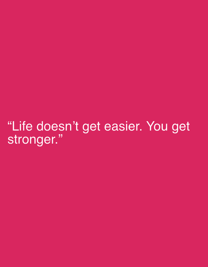 The image displays a motivational quote against a solid, vibrant fuchsia or hot pink background. The text, in white sans-serif font, is centered vertically and left-aligned on the image. The quote reads: "Life doesn't get easier. You get stronger." The entire quote is enclosed within quotation marks. There are no other subjects, objects, or activities depicted in the image.
